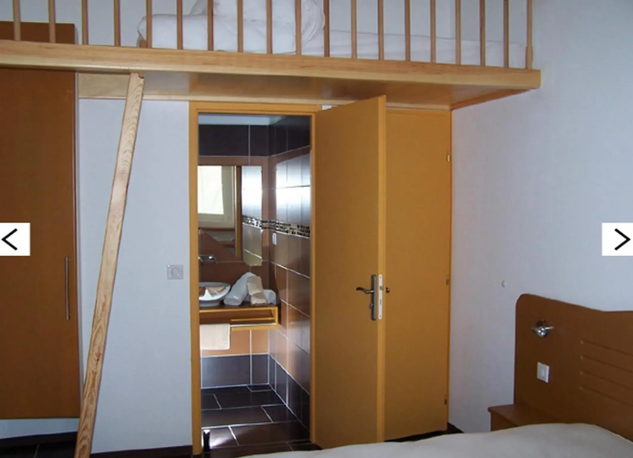 Photo of the whole room, Bathroom in Hôtel Le Richevaux