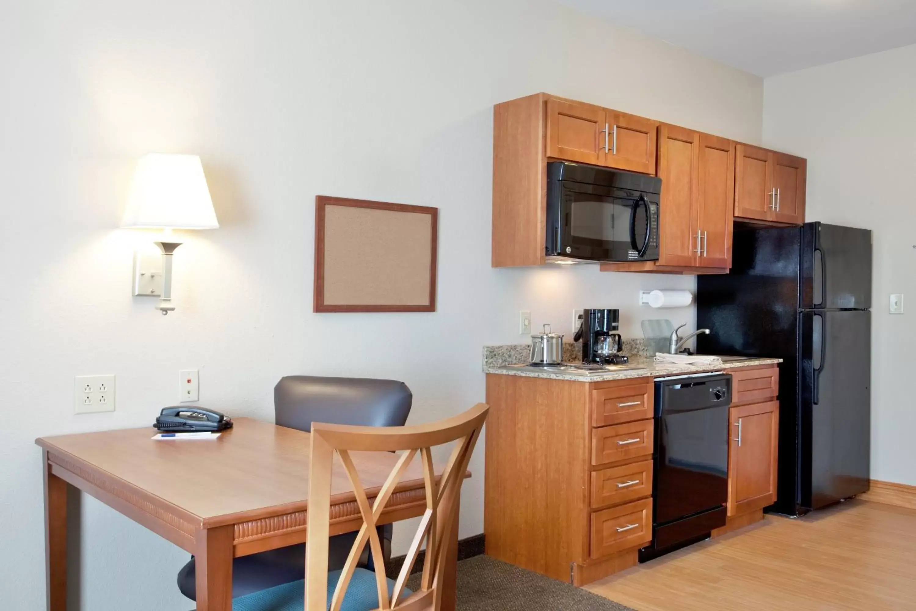 Photo of the whole room, Kitchen/Kitchenette in Candlewood Suites Slidell Northshore, an IHG Hotel