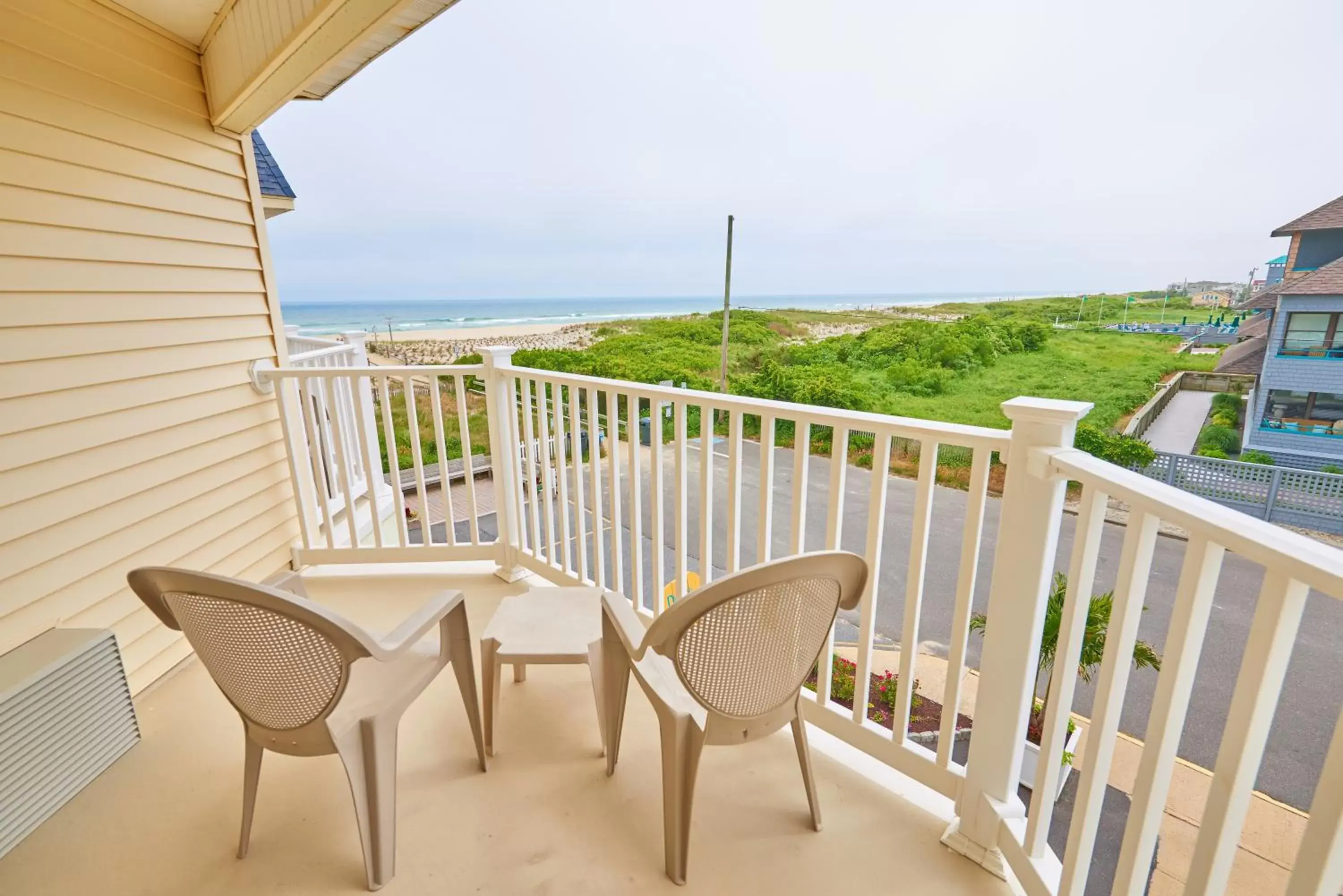 Property building, Balcony/Terrace in Drifting Sands Oceanfront Hotel