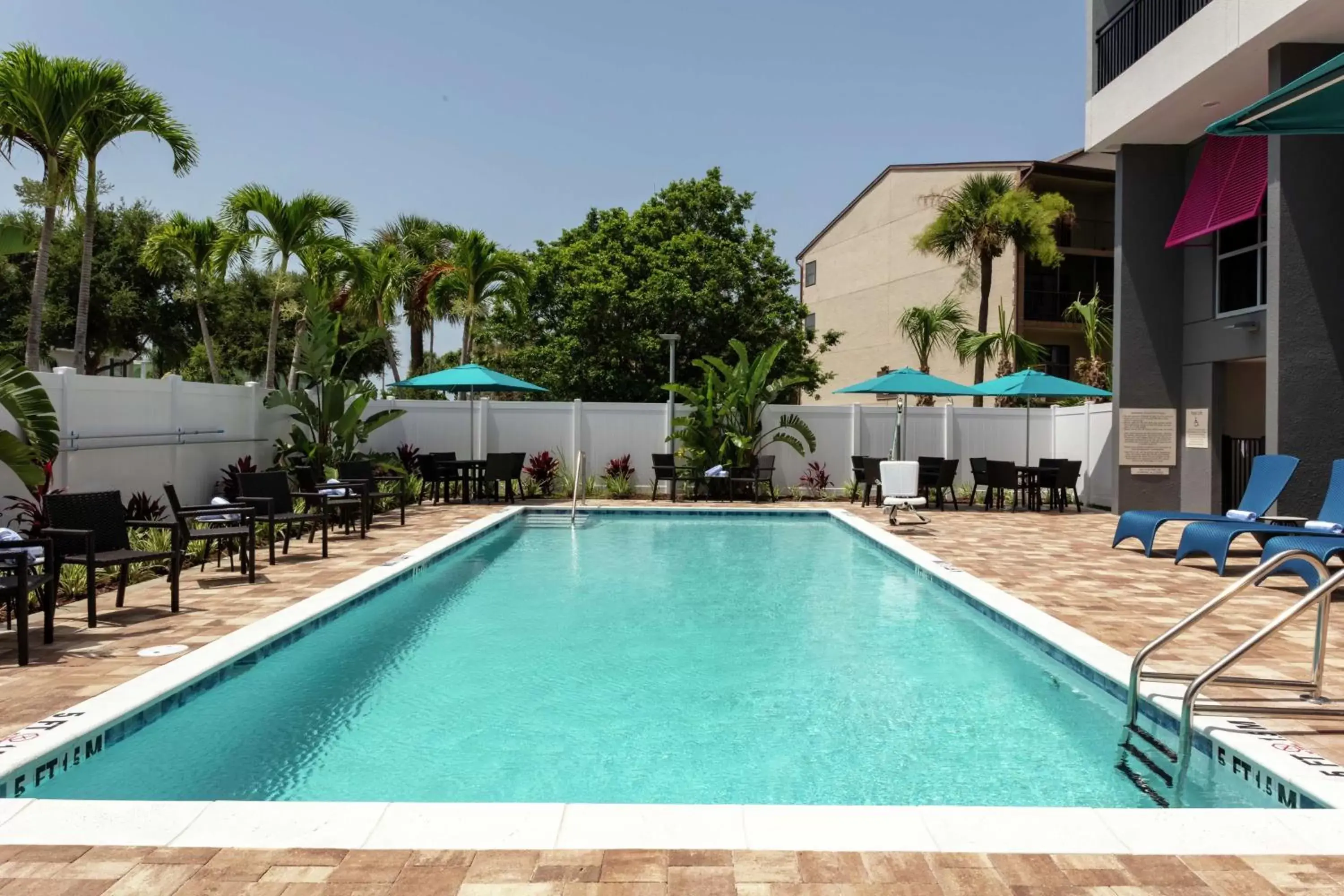 Pool view, Swimming Pool in Hampton Inn Dunedin, Fl