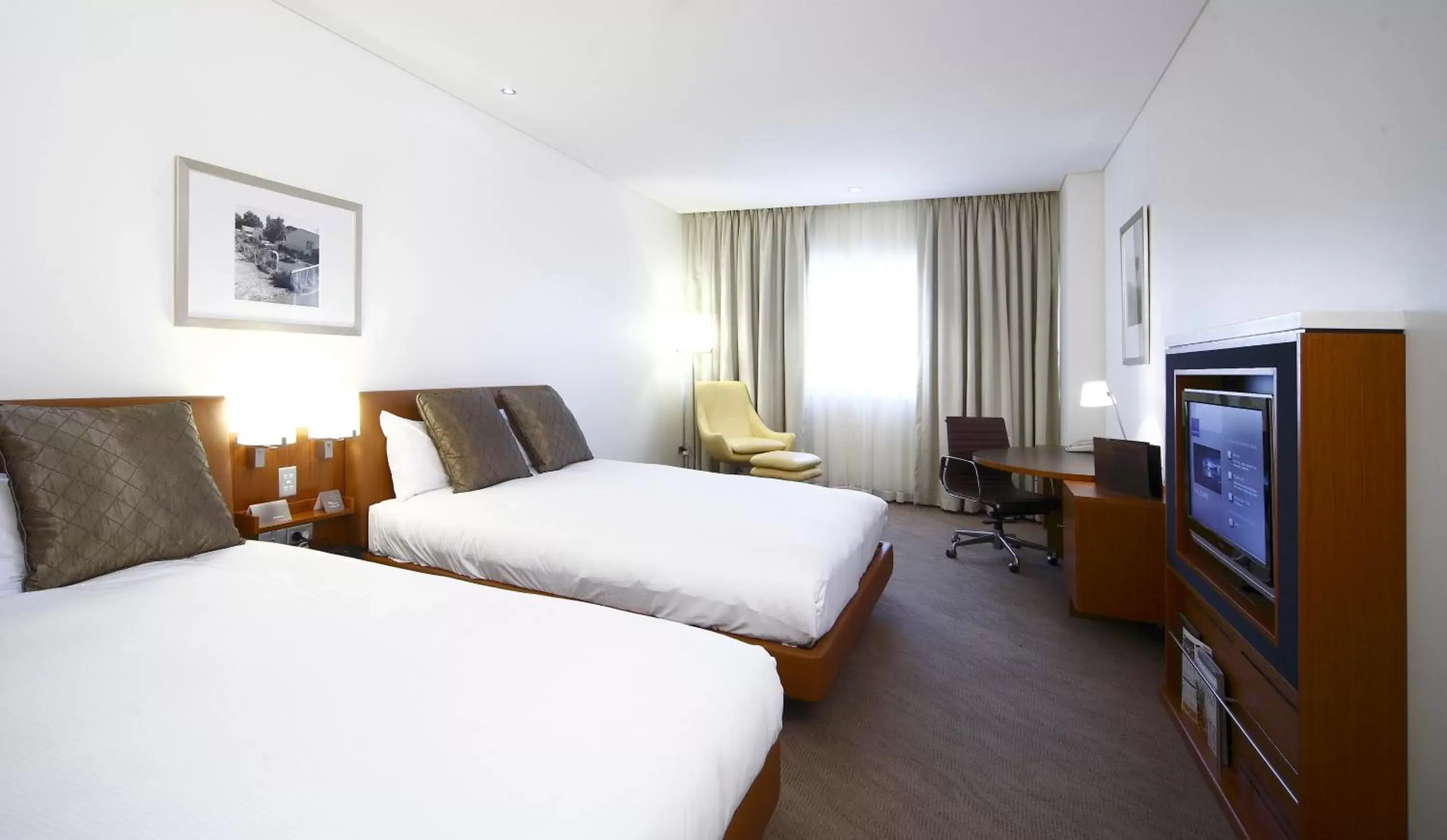 Photo of the whole room, Bed in Novotel Canberra