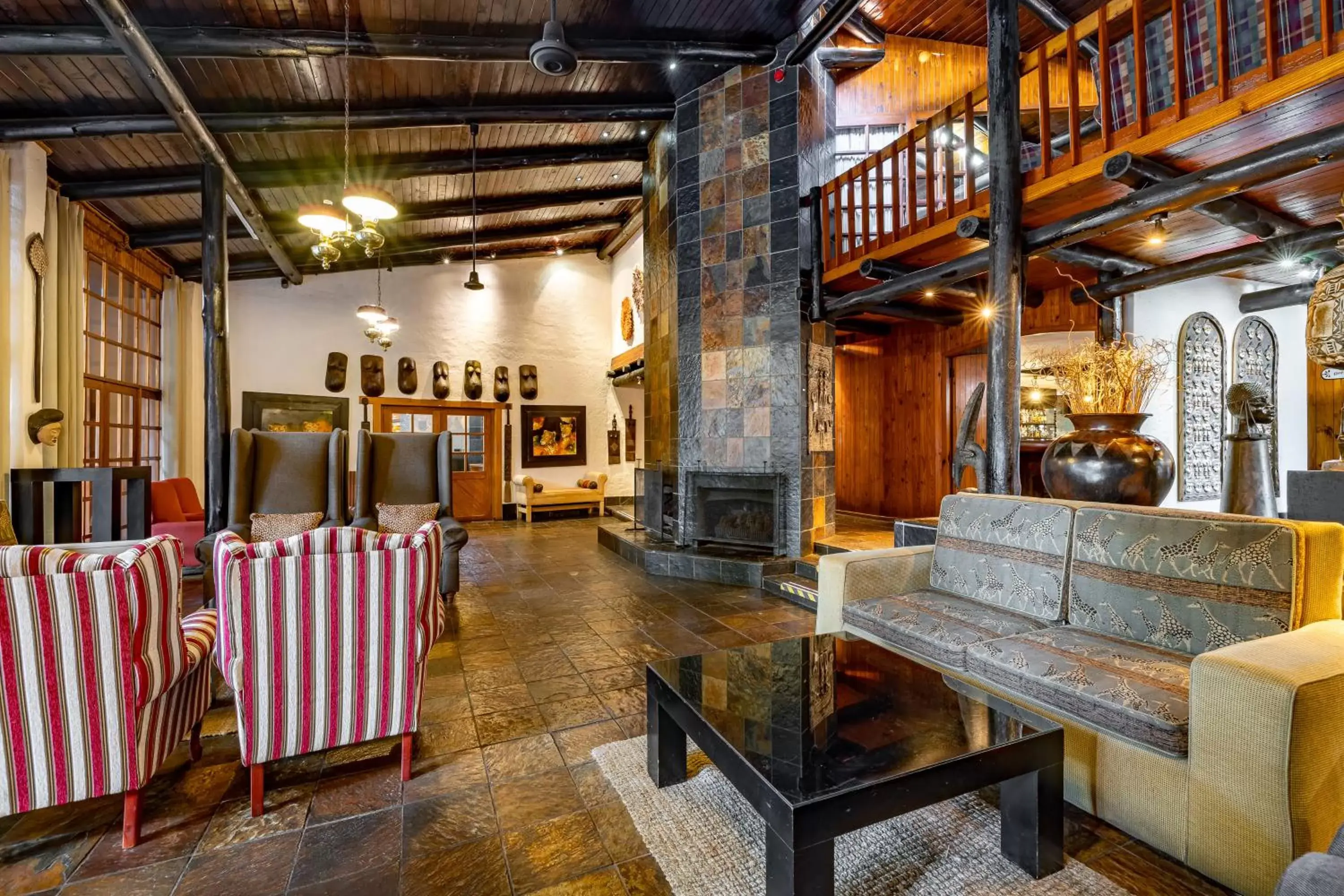 Living room in African Sky Hotels - Pine Lake Inn Living room in African Sky Hotels - Pine Lake Inn