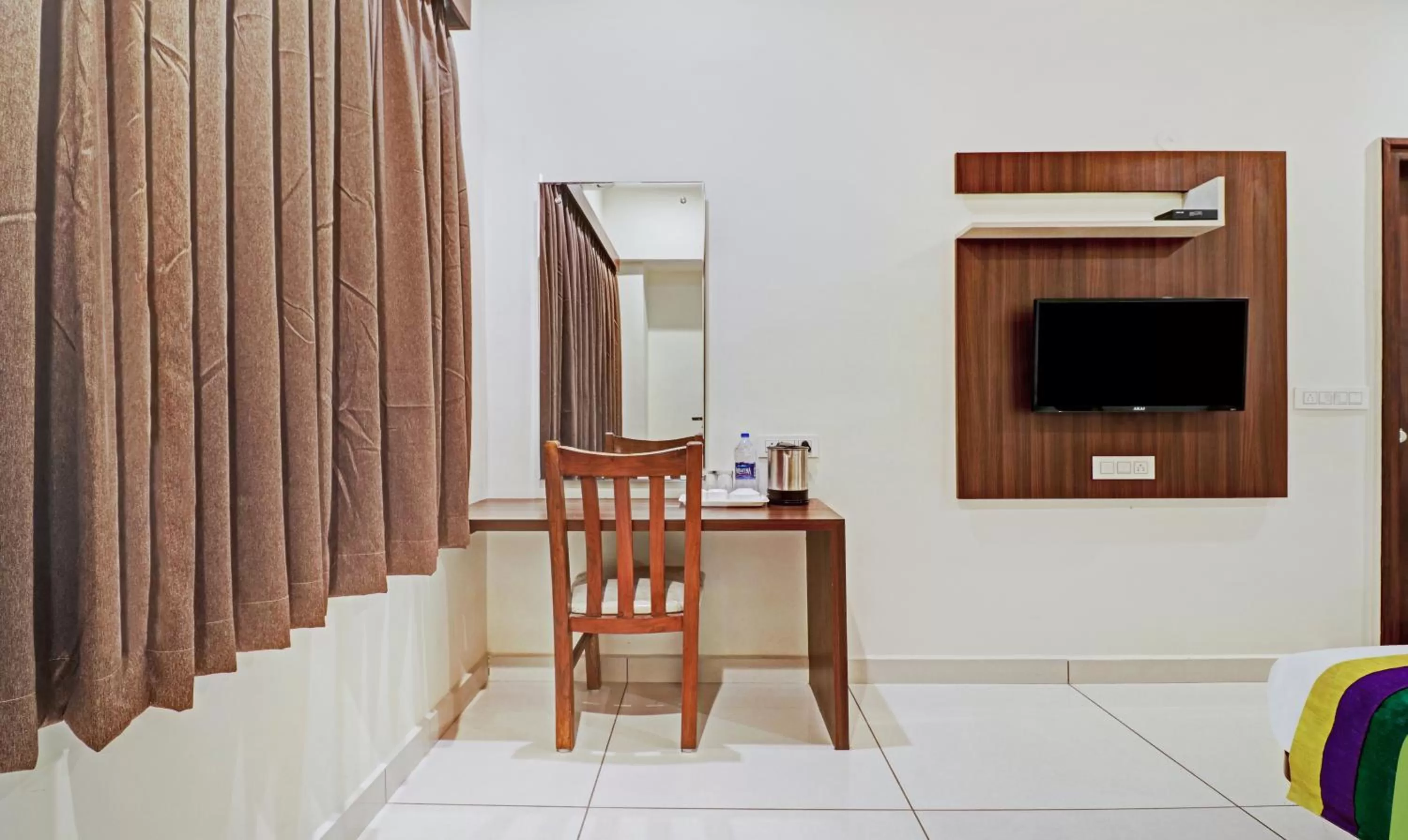 Bedroom in Treebo RJ Residency