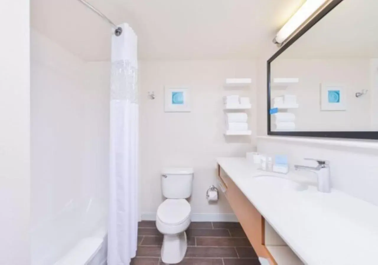 Bathroom in SureStay Plus Hotel by Best Western Vero Beach