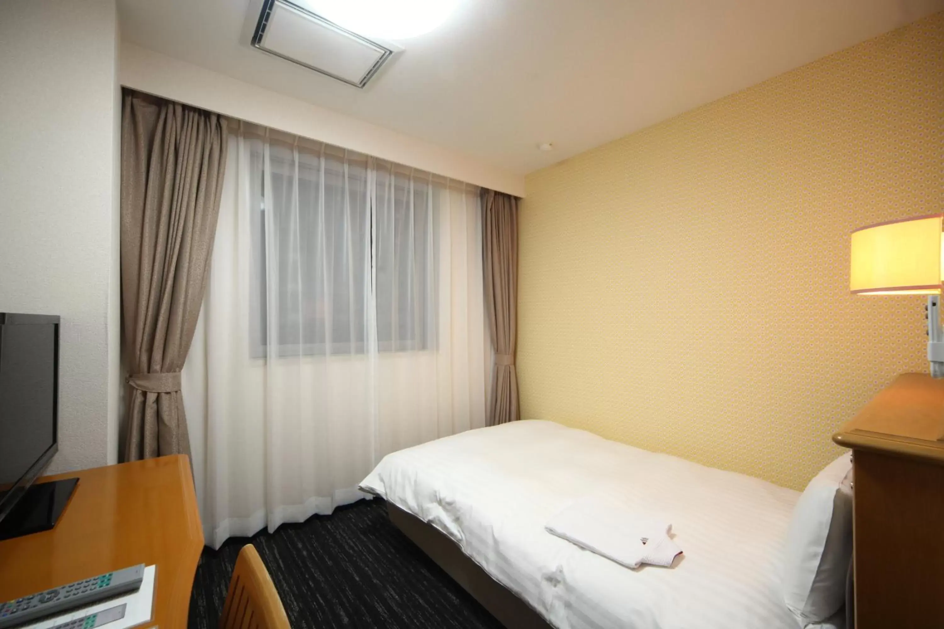 Photo of the whole room, Bed in Hotel Wing International Tomakomai