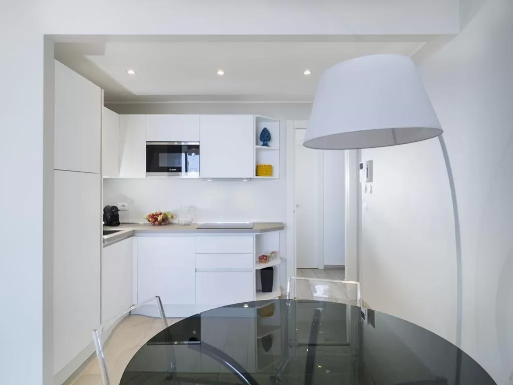 Kitchen or kitchenette in Isola Bella Infinity Suites