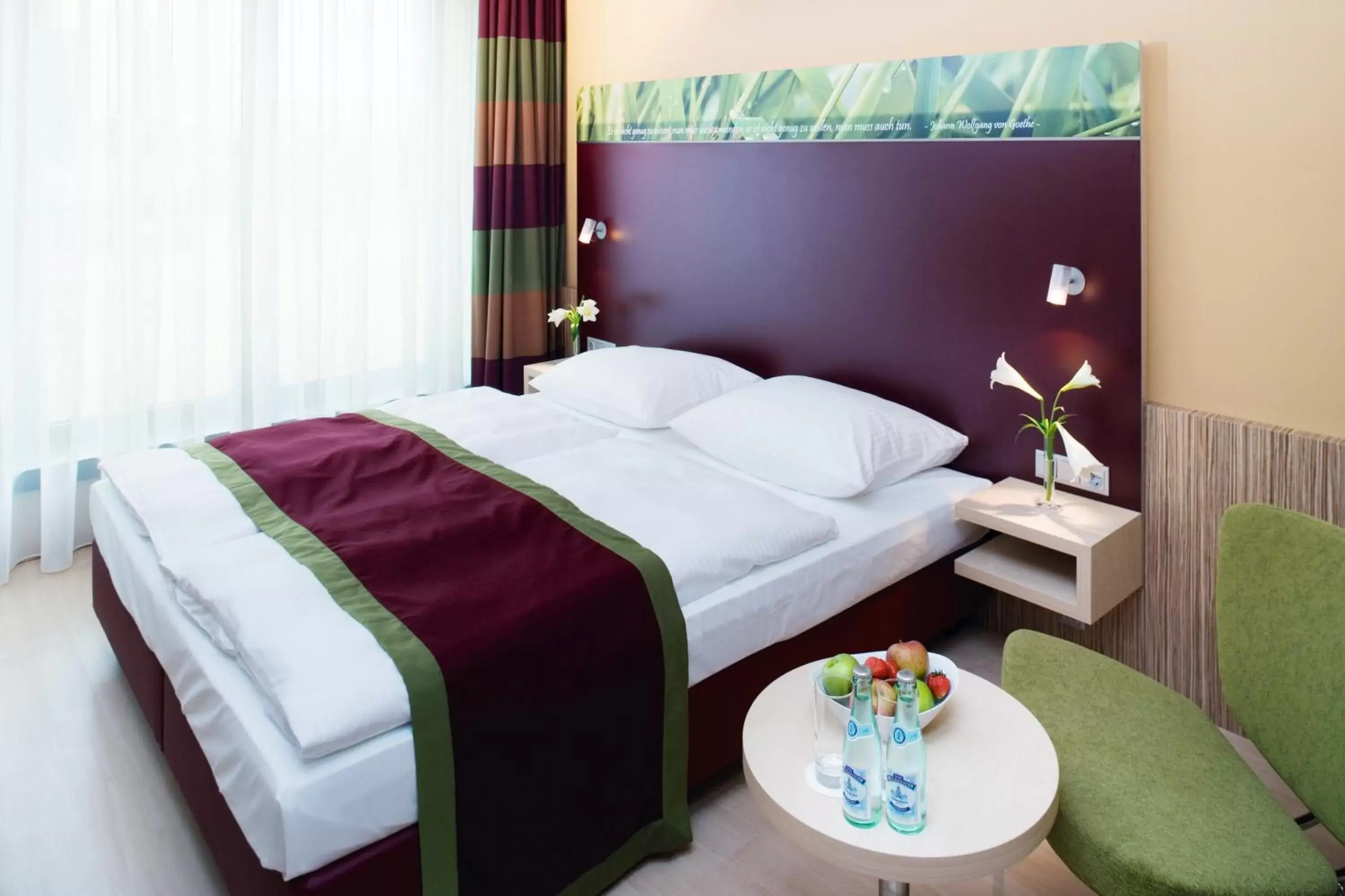 Bed in Mövenpick Hotel Frankfurt City Messe