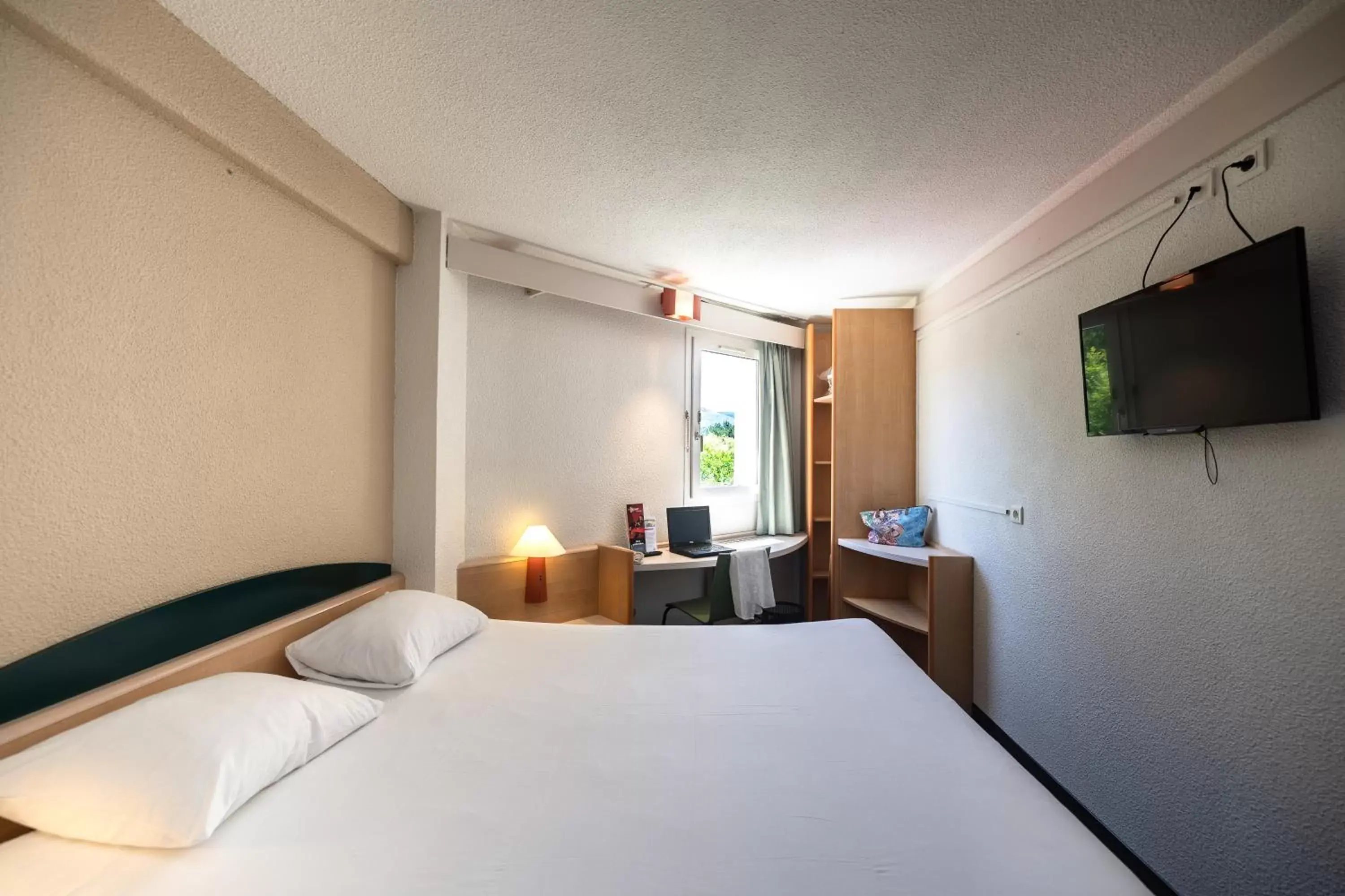 Bed in Hotel ibis Autun