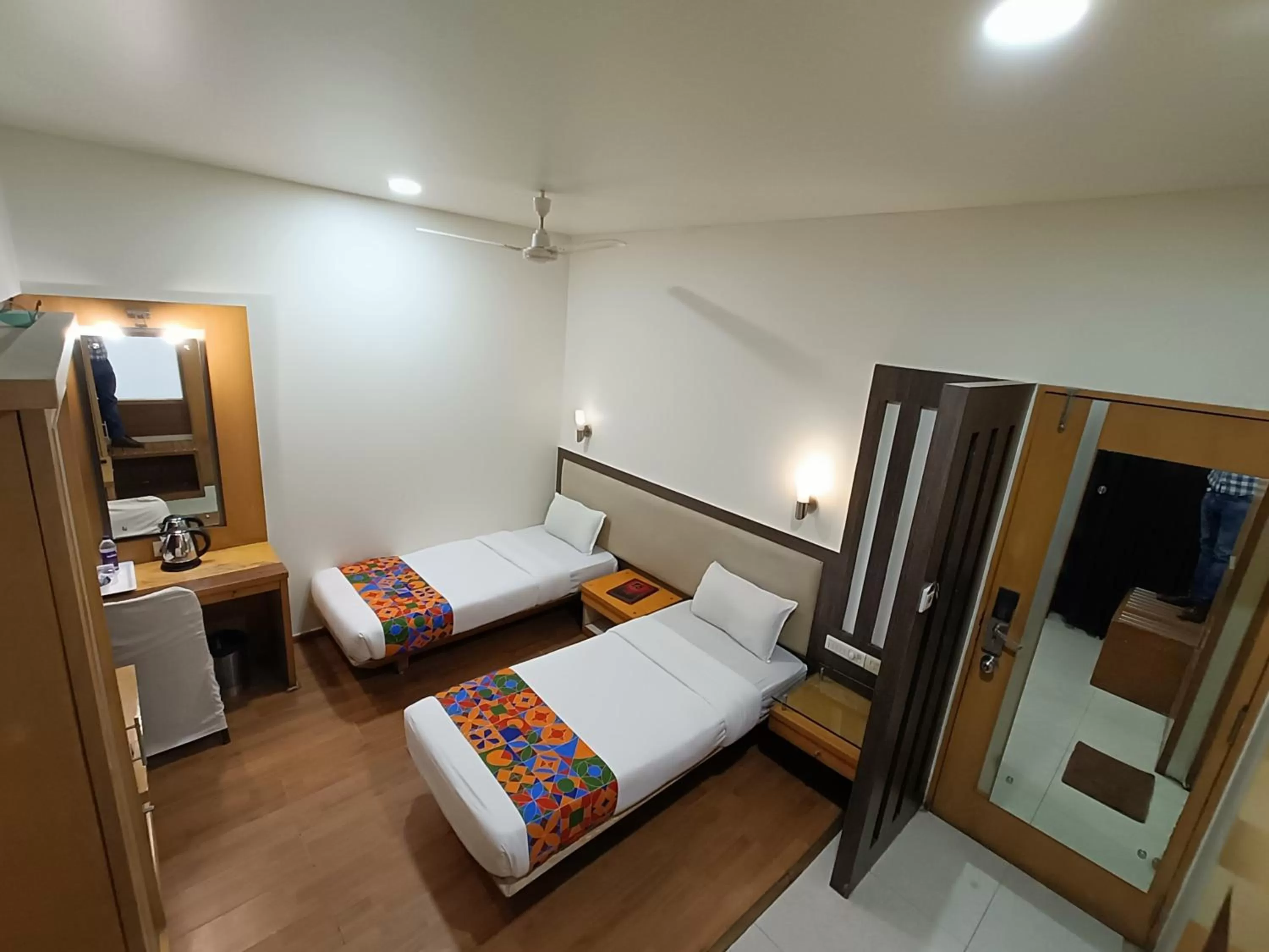 Bed in Rapid Lakme Executive Hotel