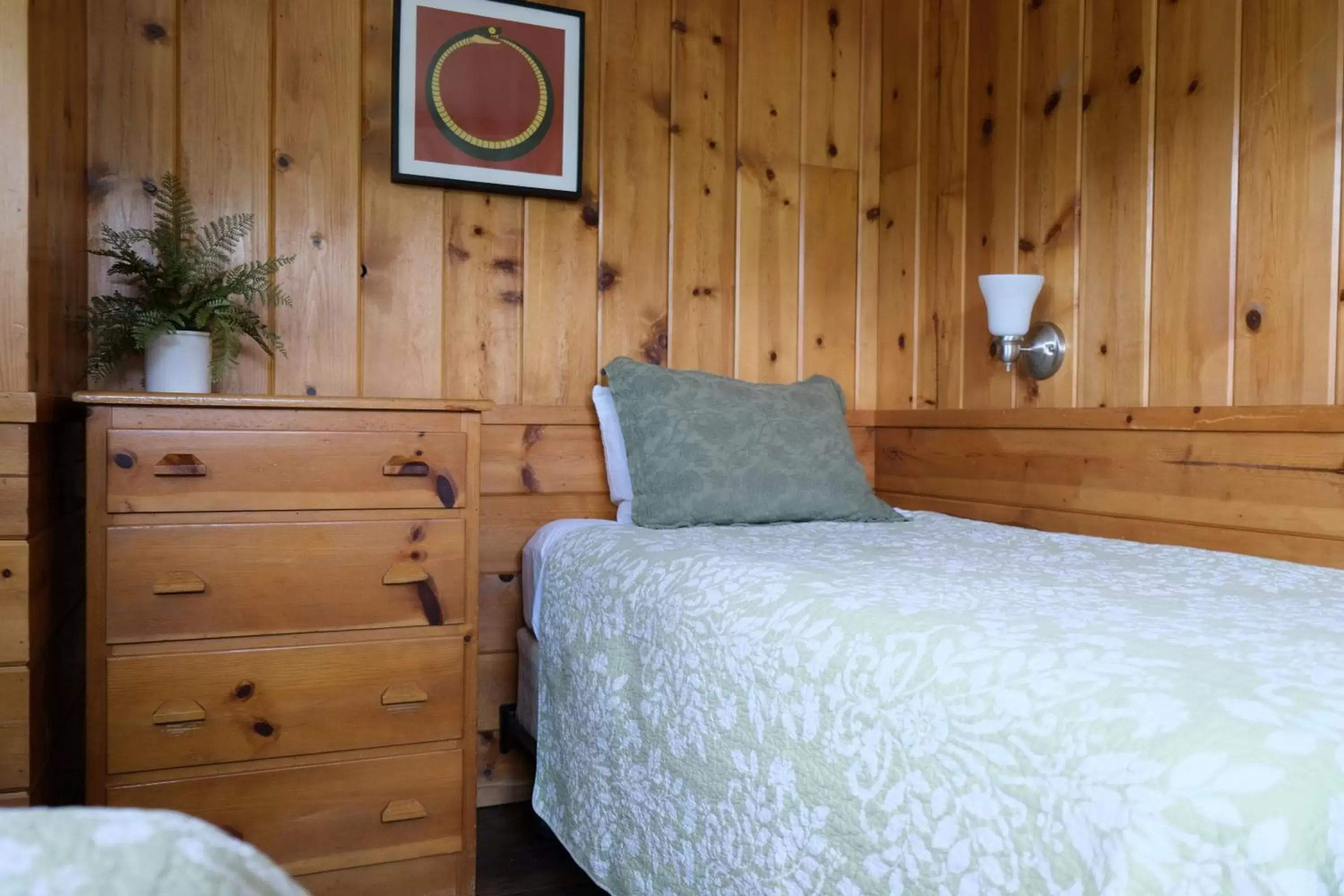 Bed in Lake Front Cabins