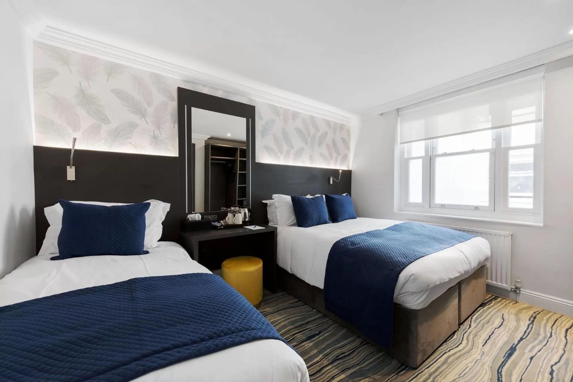 Bed in Commodore Hotel