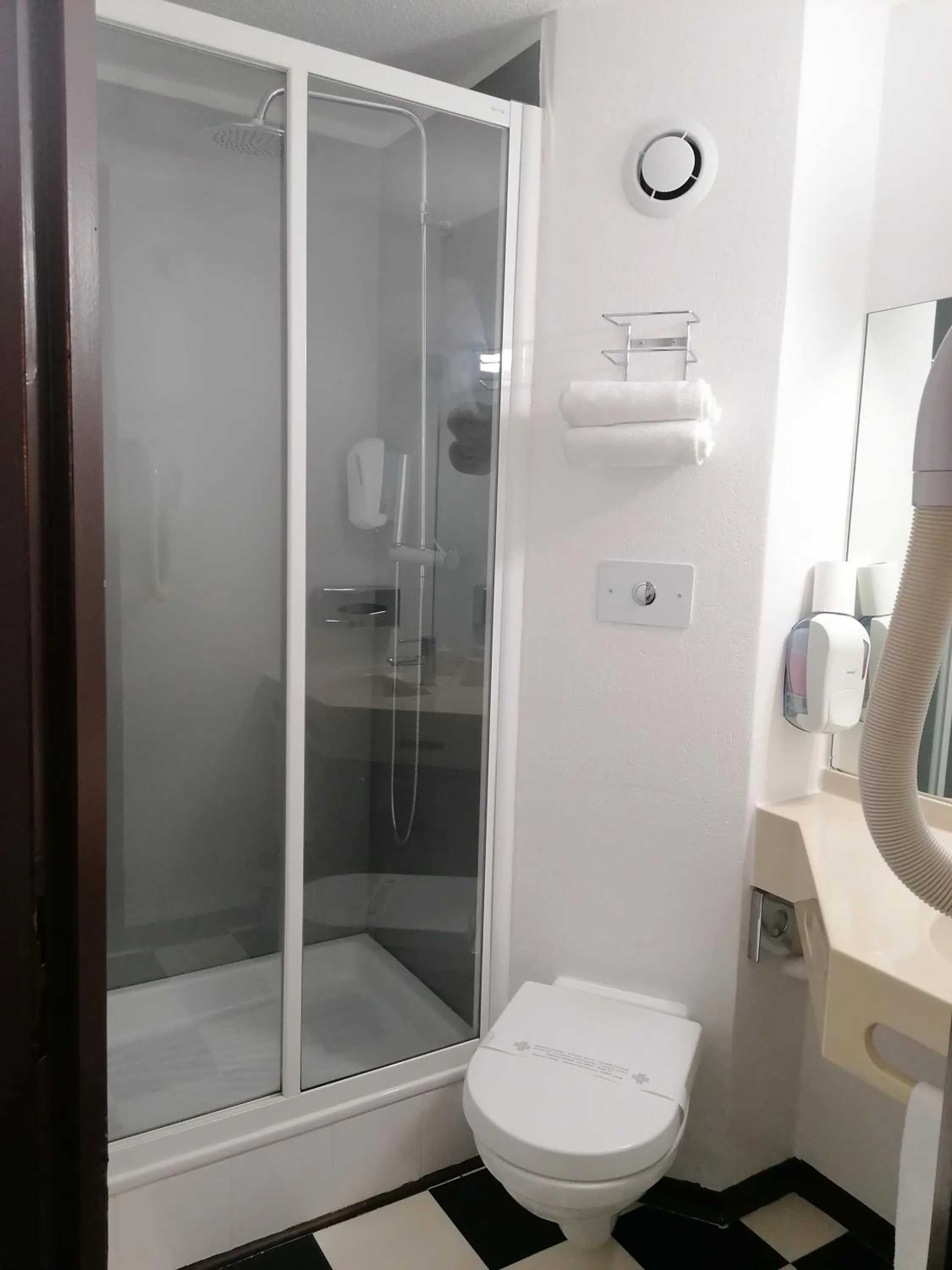 Shower in Enzo Hotels Vierzon by Kyriad Direct