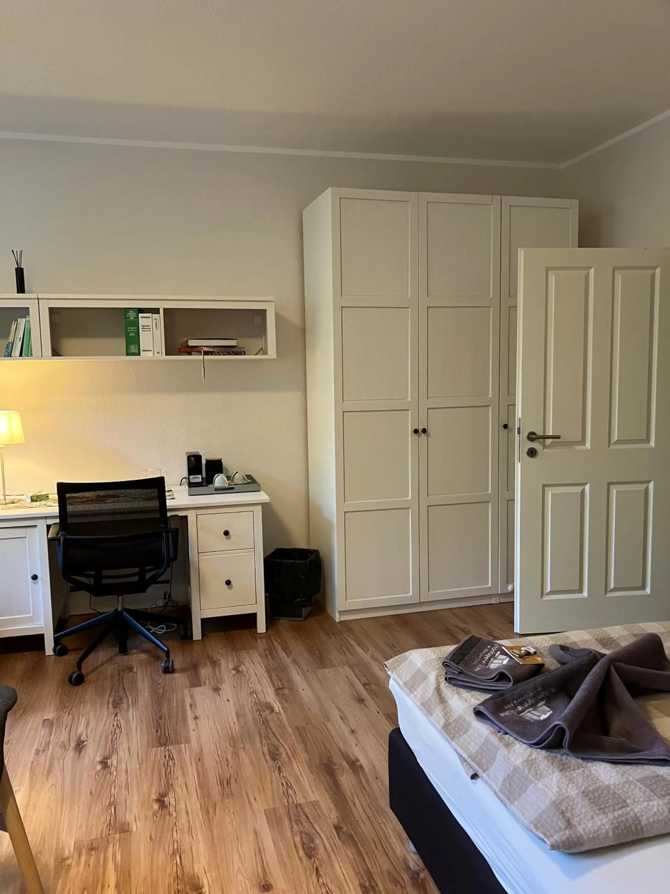 wardrobe, Bed in Biohotel Schönhagener Mühle