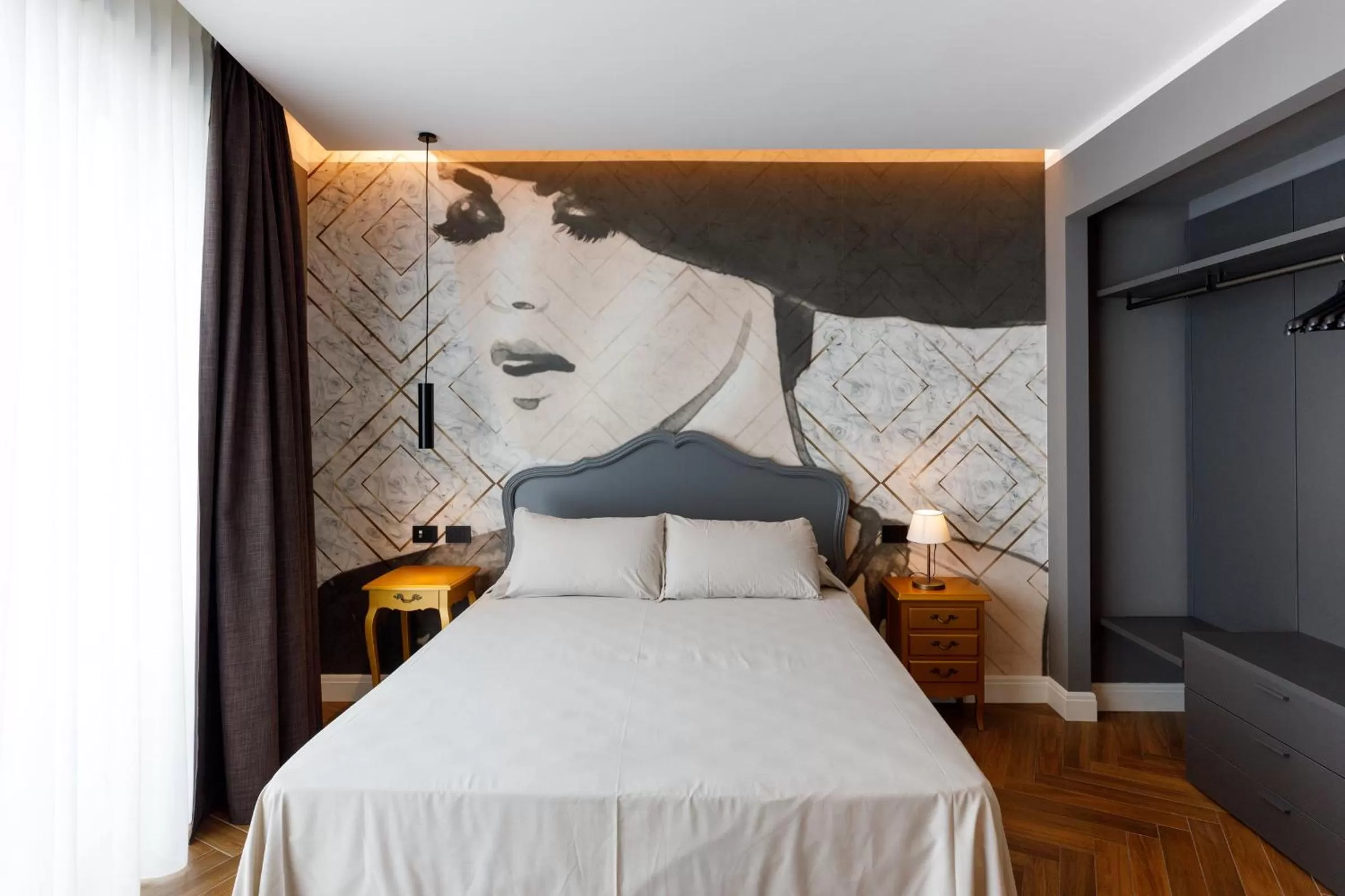 Bed in Art Hotel Ventaglio