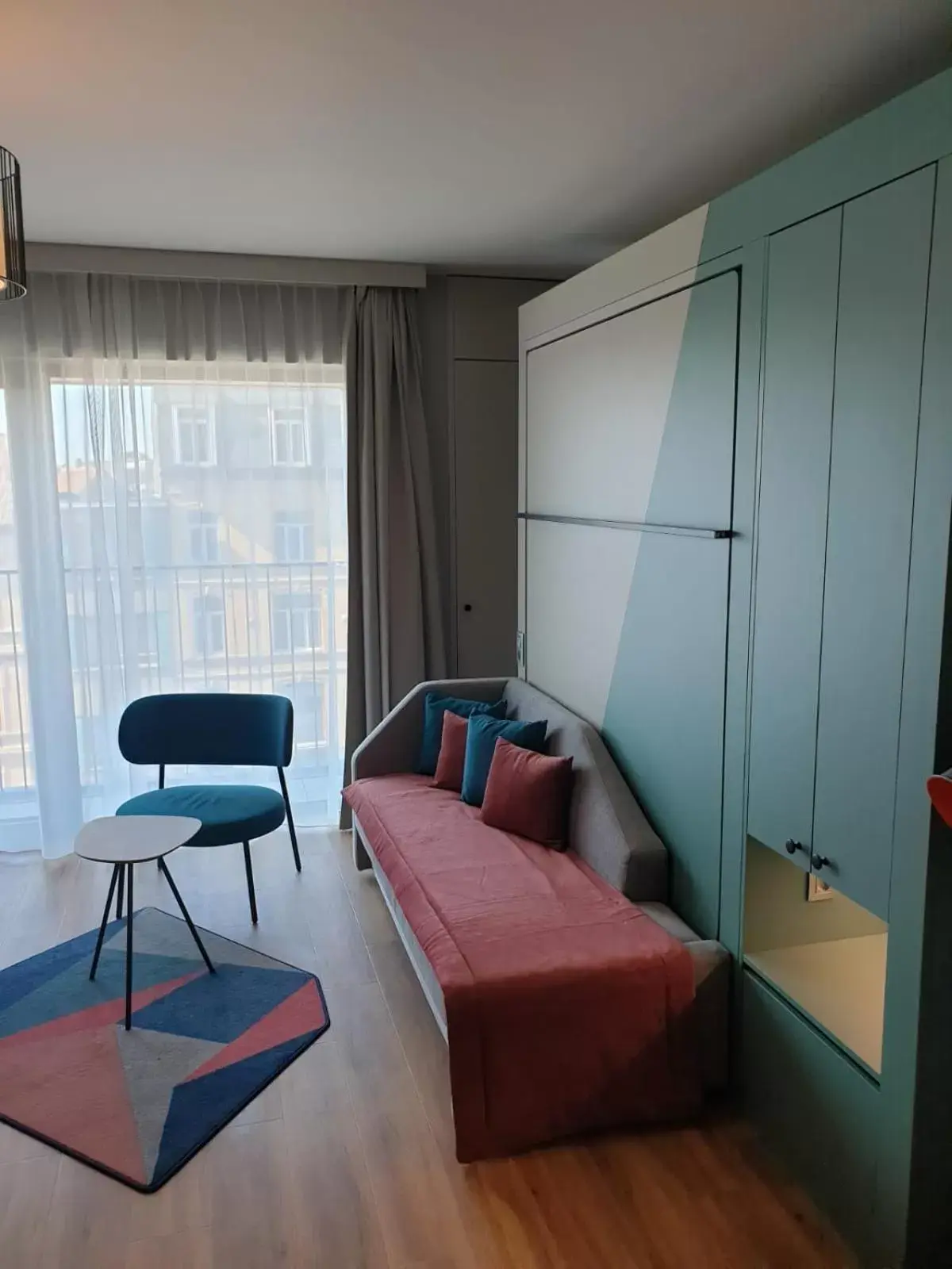 Bed, Seating Area in Aparthotel Adagio Antwerp City Center