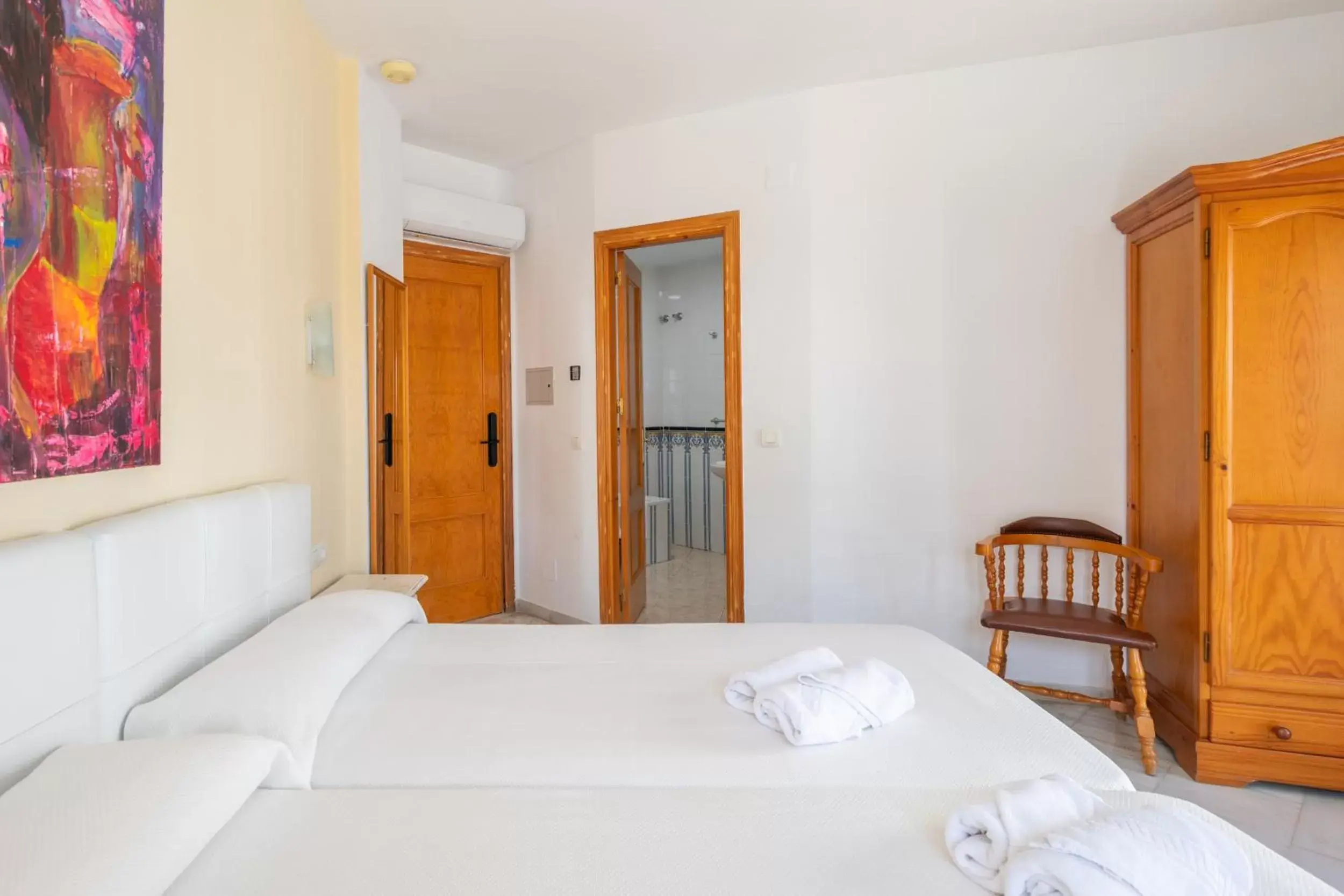 Bed in Apartahotel Playamaro by Dorobe Bed in Apartahotel Playamaro by Dorobe