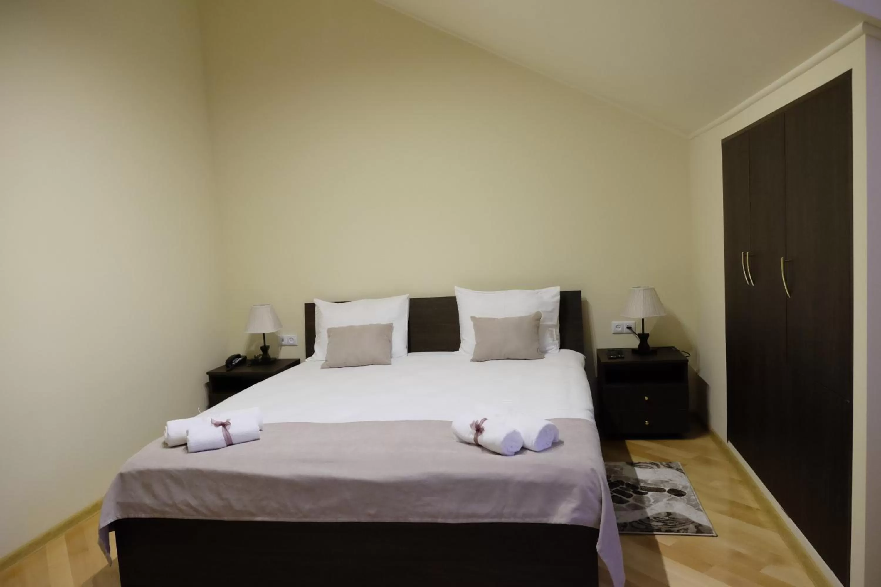 Bed in S&L Boutique Hotel