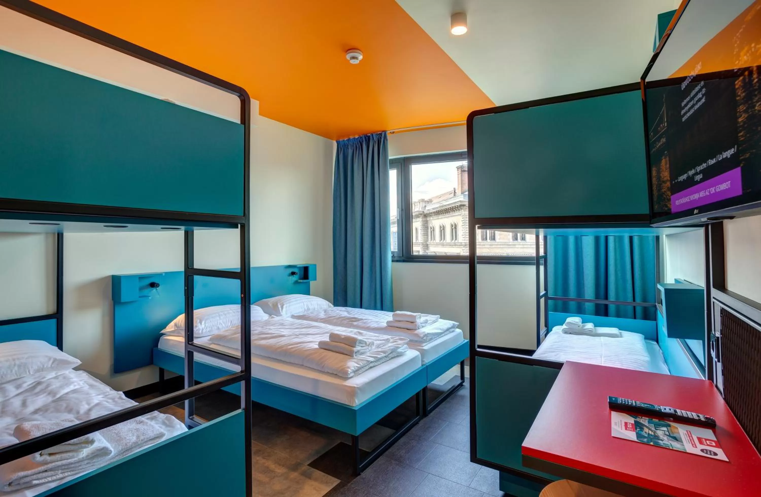 Photo of the whole room, Bed in MEININGER Budapest Great Market Hall