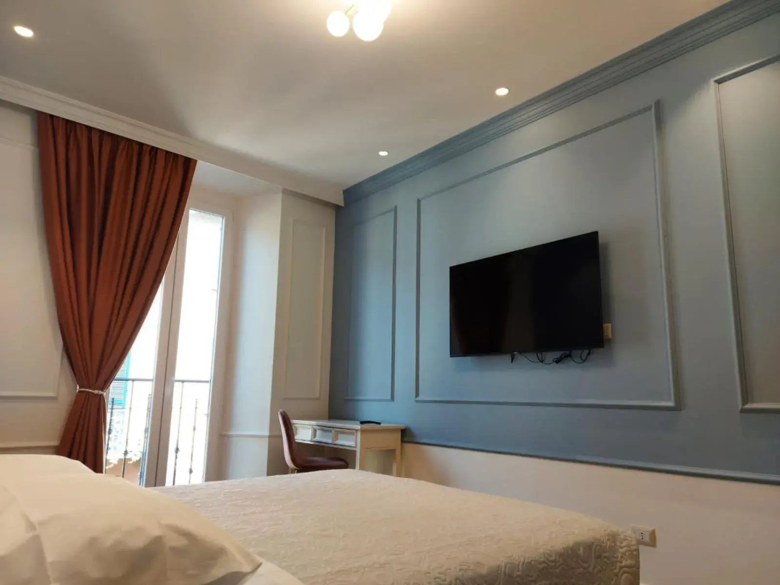 Bed, TV/Entertainment Center in Hotel Borgovico