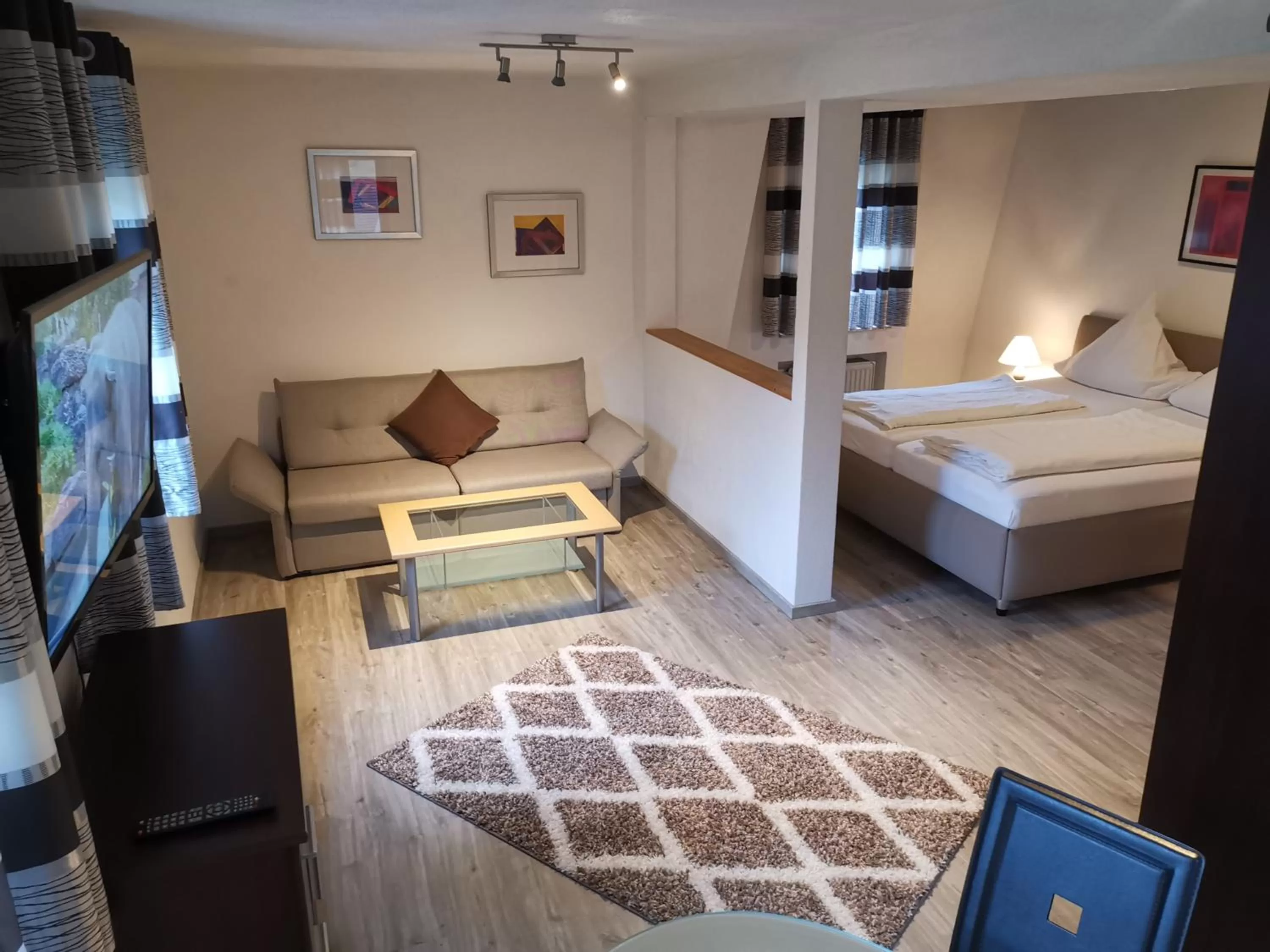 Photo of the whole room, Bed in Hotel Grüner Baum mit Restaurant & Wellness