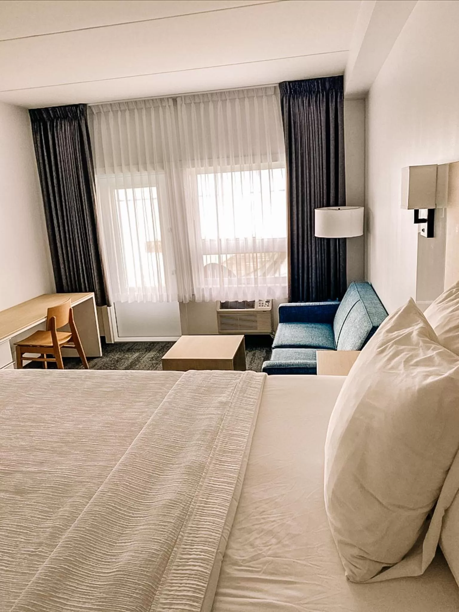 Bed in La Place Rendez-Vous Hotel