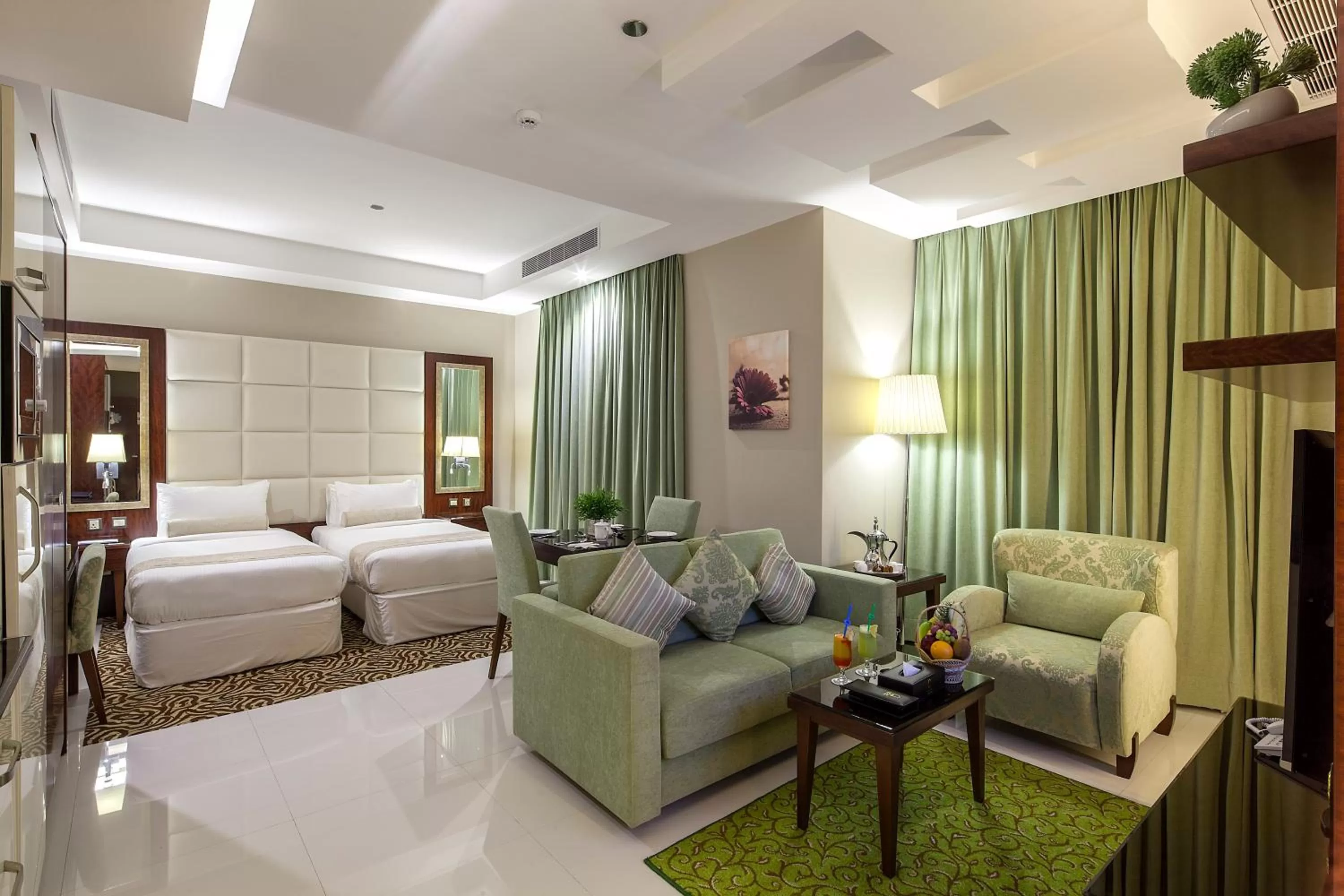 Bed, Seating Area in Western Lamar Hotel