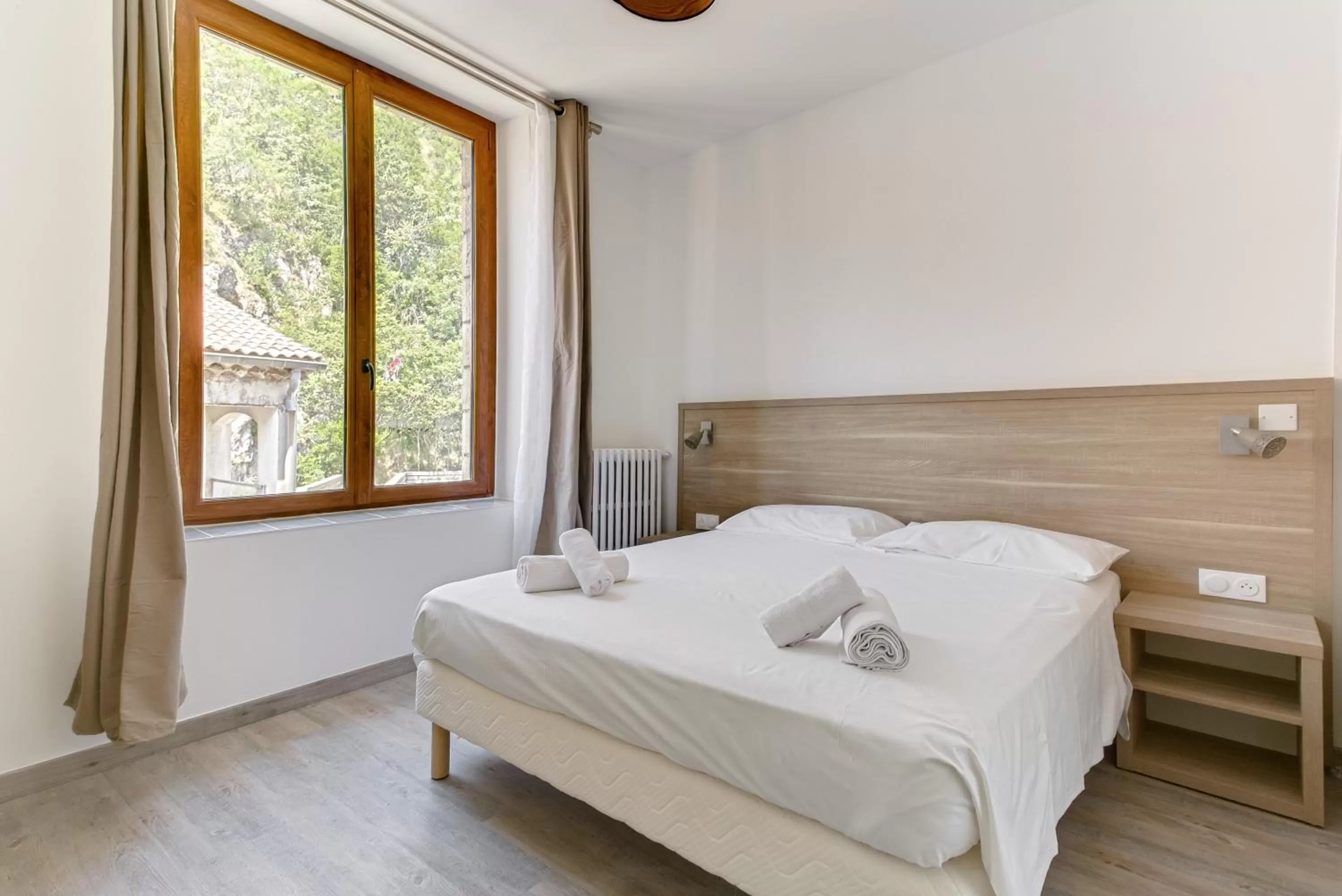 Bed in Hôtel de la Citadelle