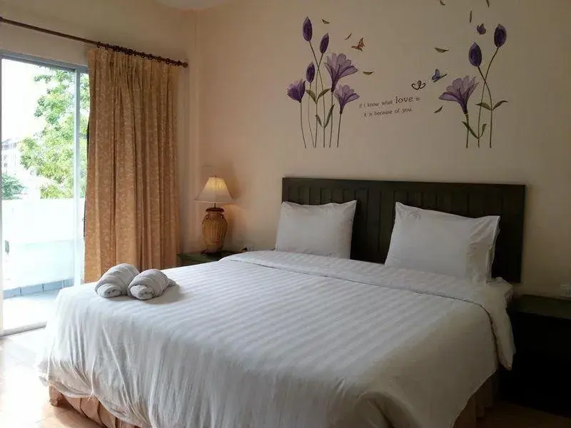 Bed in Baan Suksiri Hotel Bed in Baan Suksiri Hotel