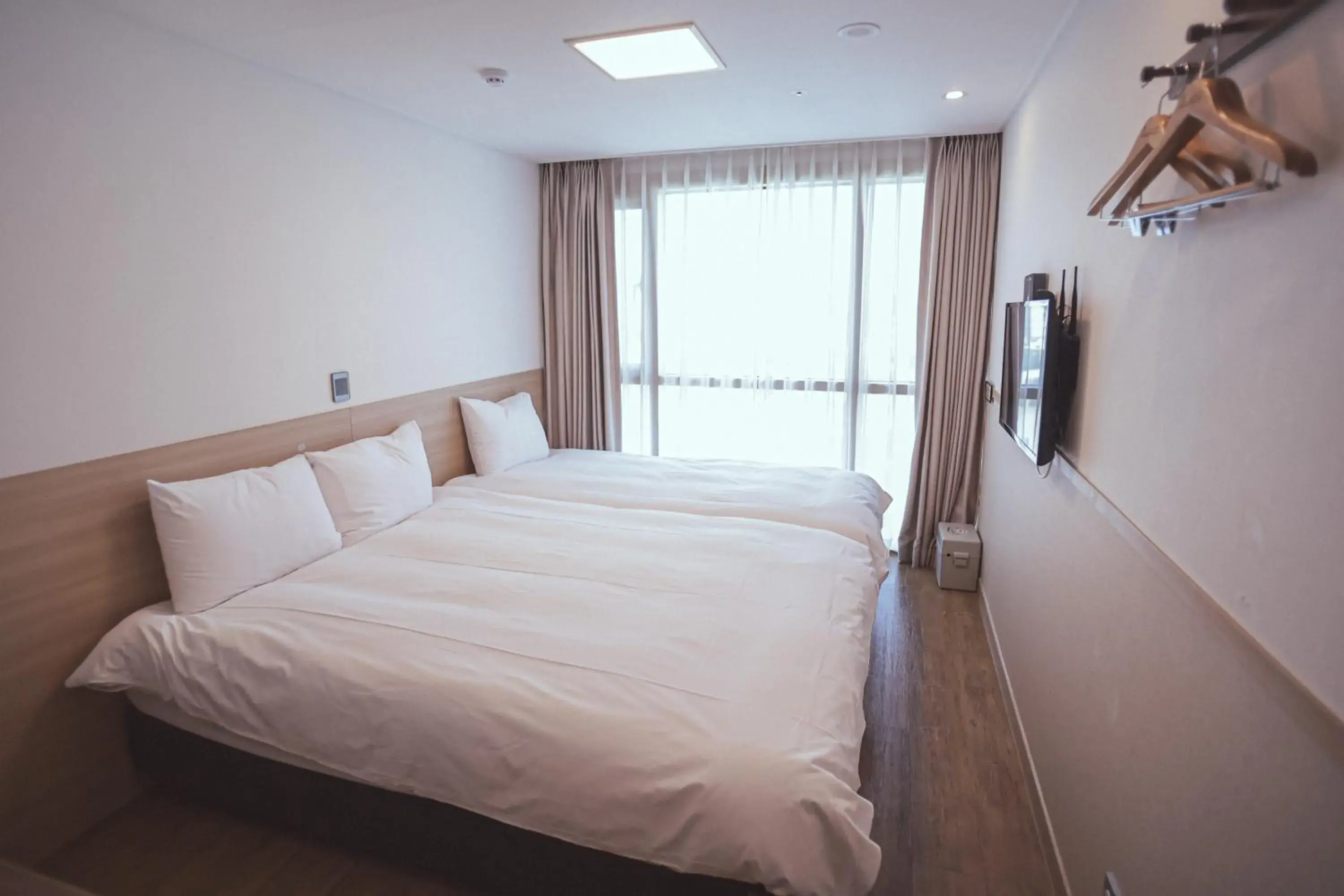 Bed in Hotel Kenny Seogwipo