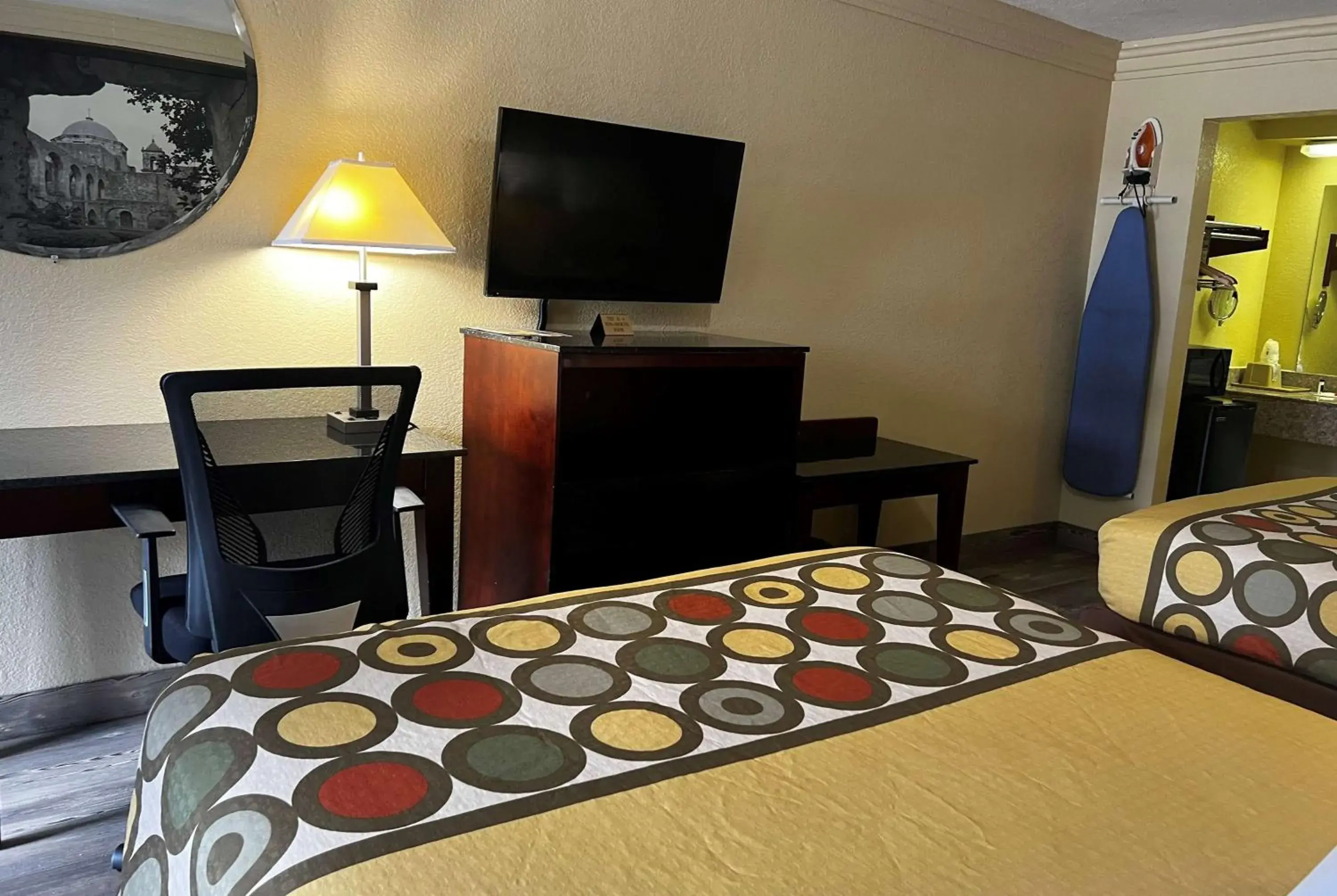 Photo of the whole room, TV/Entertainment Center in Super 8 by Wyndham Houston West Katy