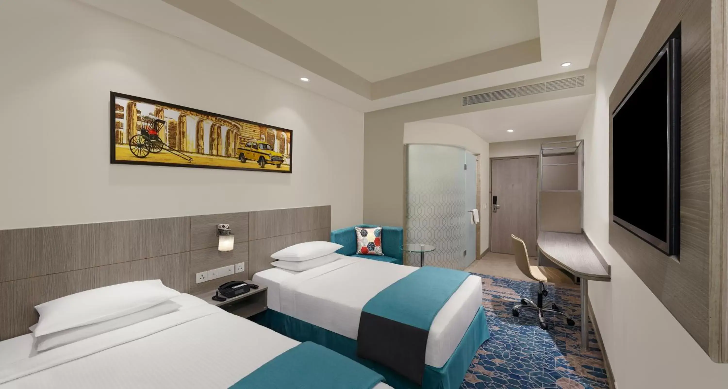 Bedroom in Holiday Inn Express Kolkata Airport, an IHG Hotel