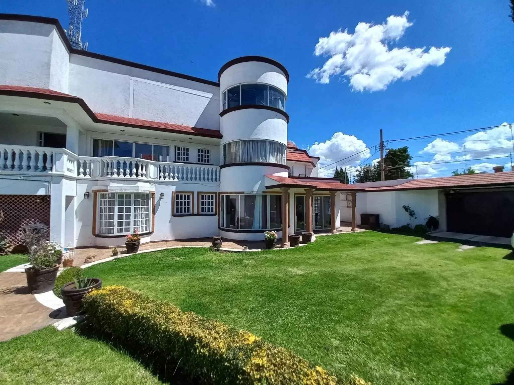 Garden, Property Building in La Aurora Hotel Like Home