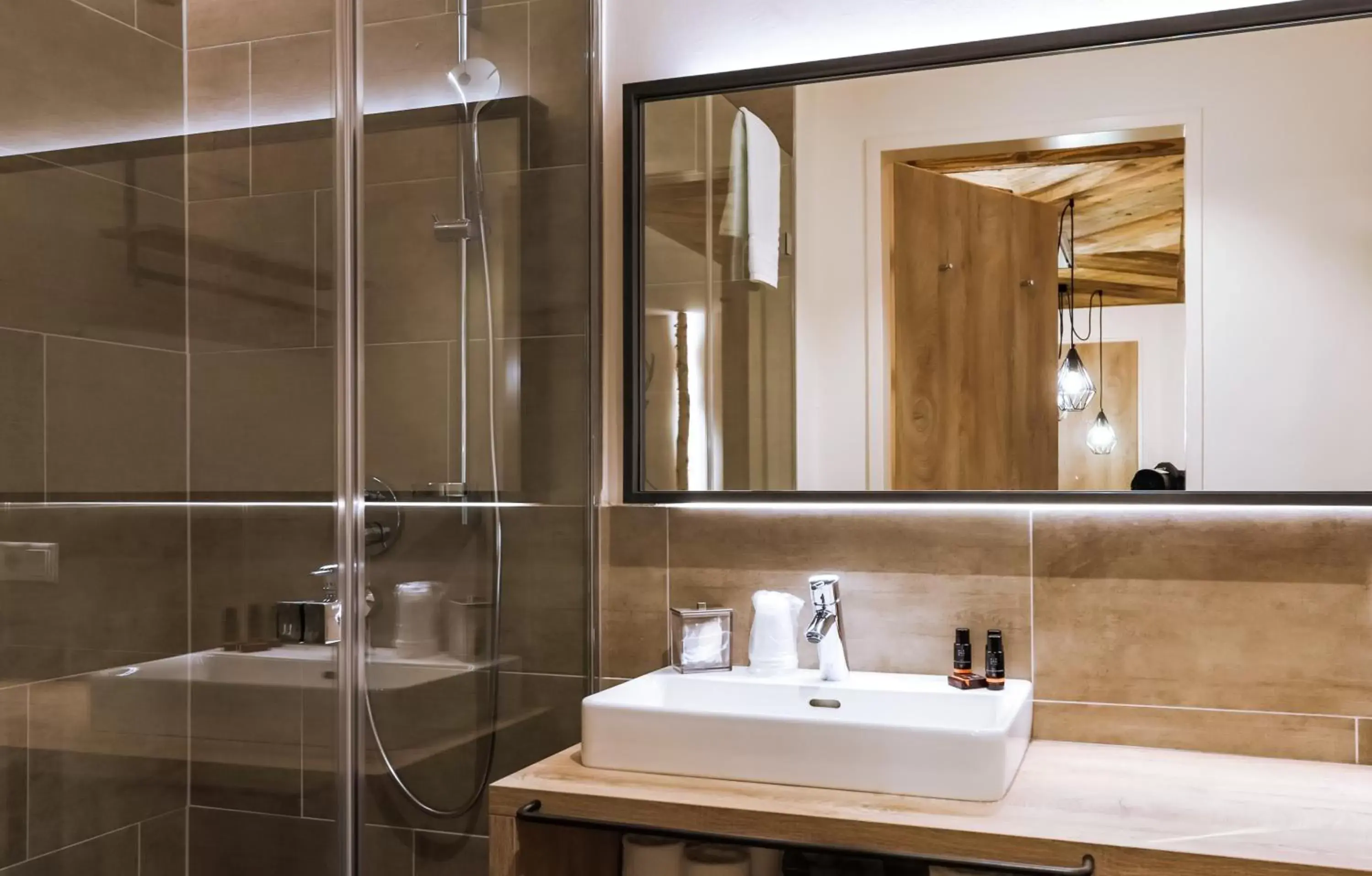 Bathroom in 24 by AvenidA Hotel & Residences Kaprun