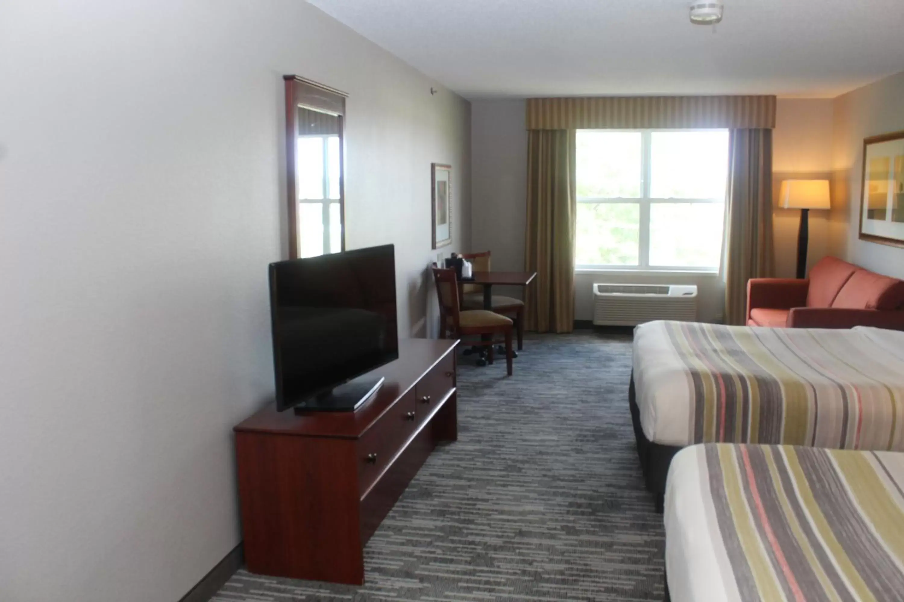 Photo of the whole room, TV/Entertainment Center in Country Inn & Suites by Radisson, Crystal Lake, IL