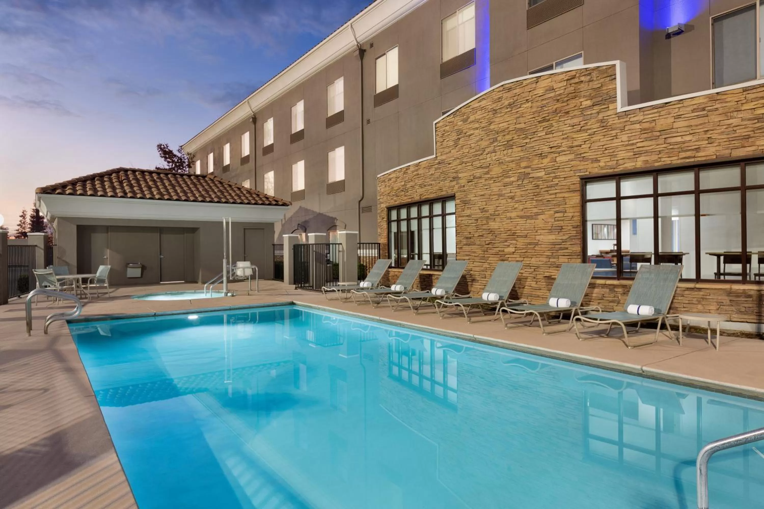Swimming pool in Holiday Inn Express & Suites Merced - Yosemite Natl Pk Area by IHG