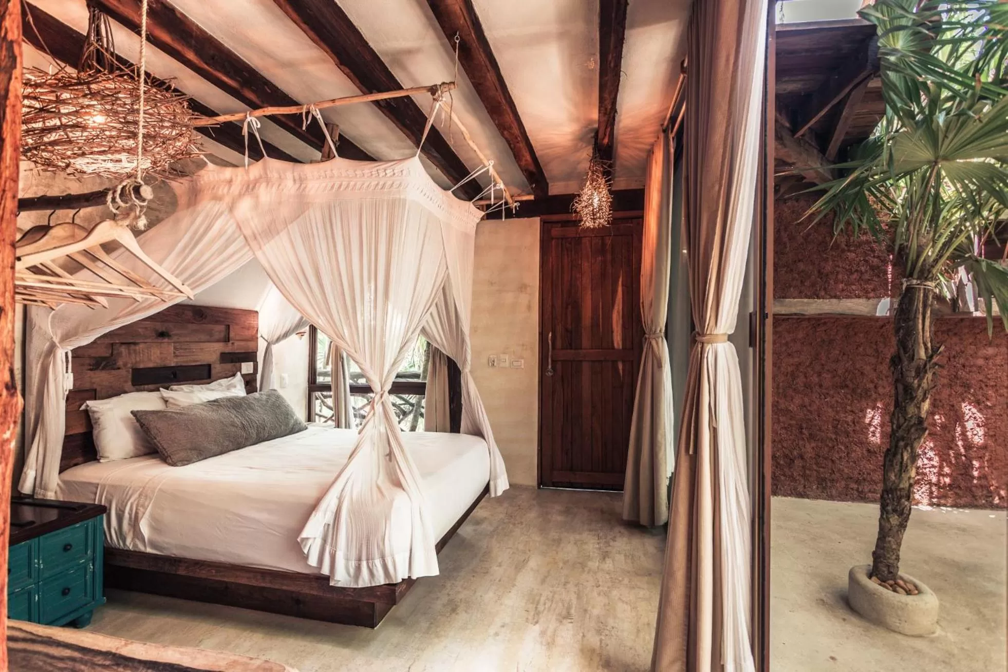 Bed in Hidden Treehouse Tulum Eco-Hotel
