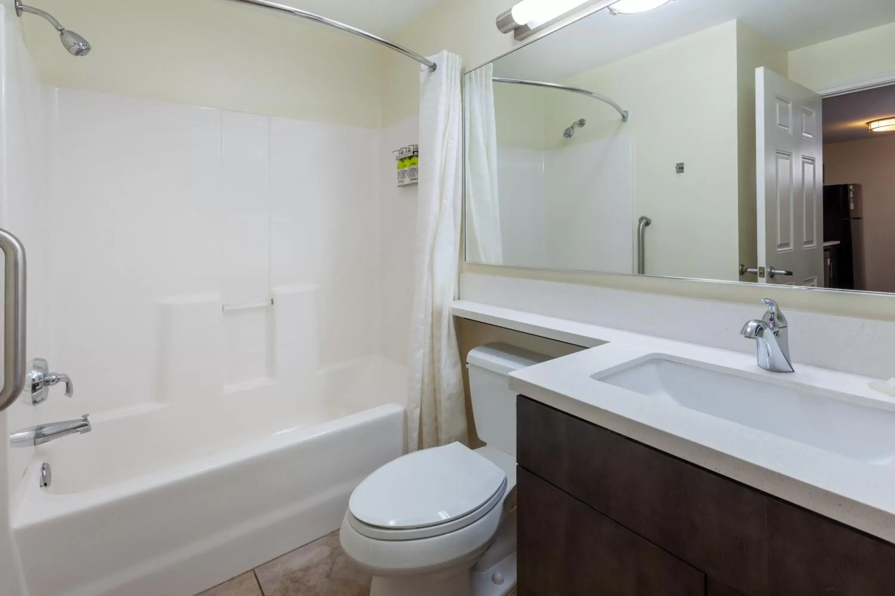 Bathroom in Candlewood Suites Kalamazoo, an IHG Hotel