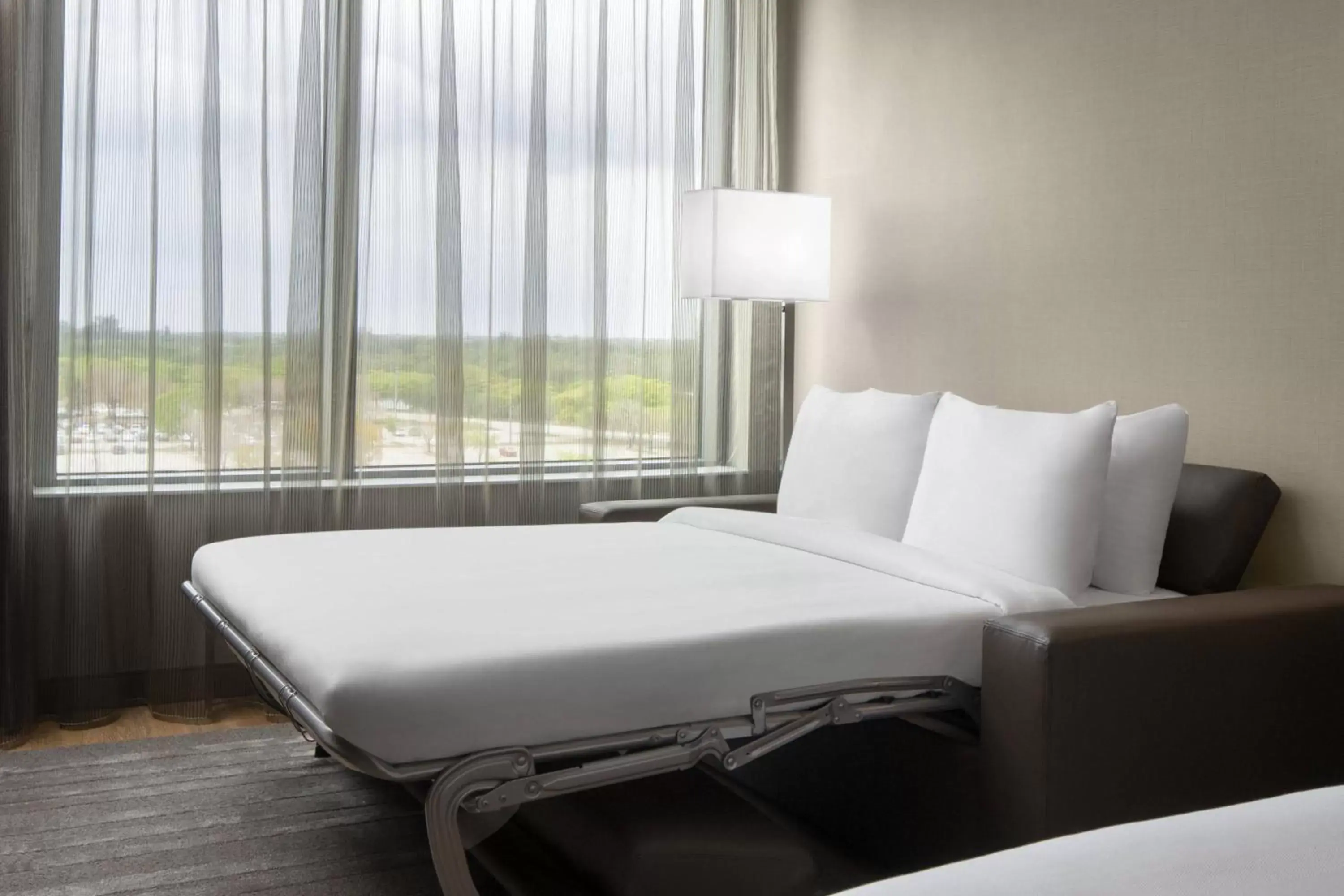Photo of the whole room, Bed in AC Hotel by Marriott Fort Lauderdale Sawgrass Mills Sunrise