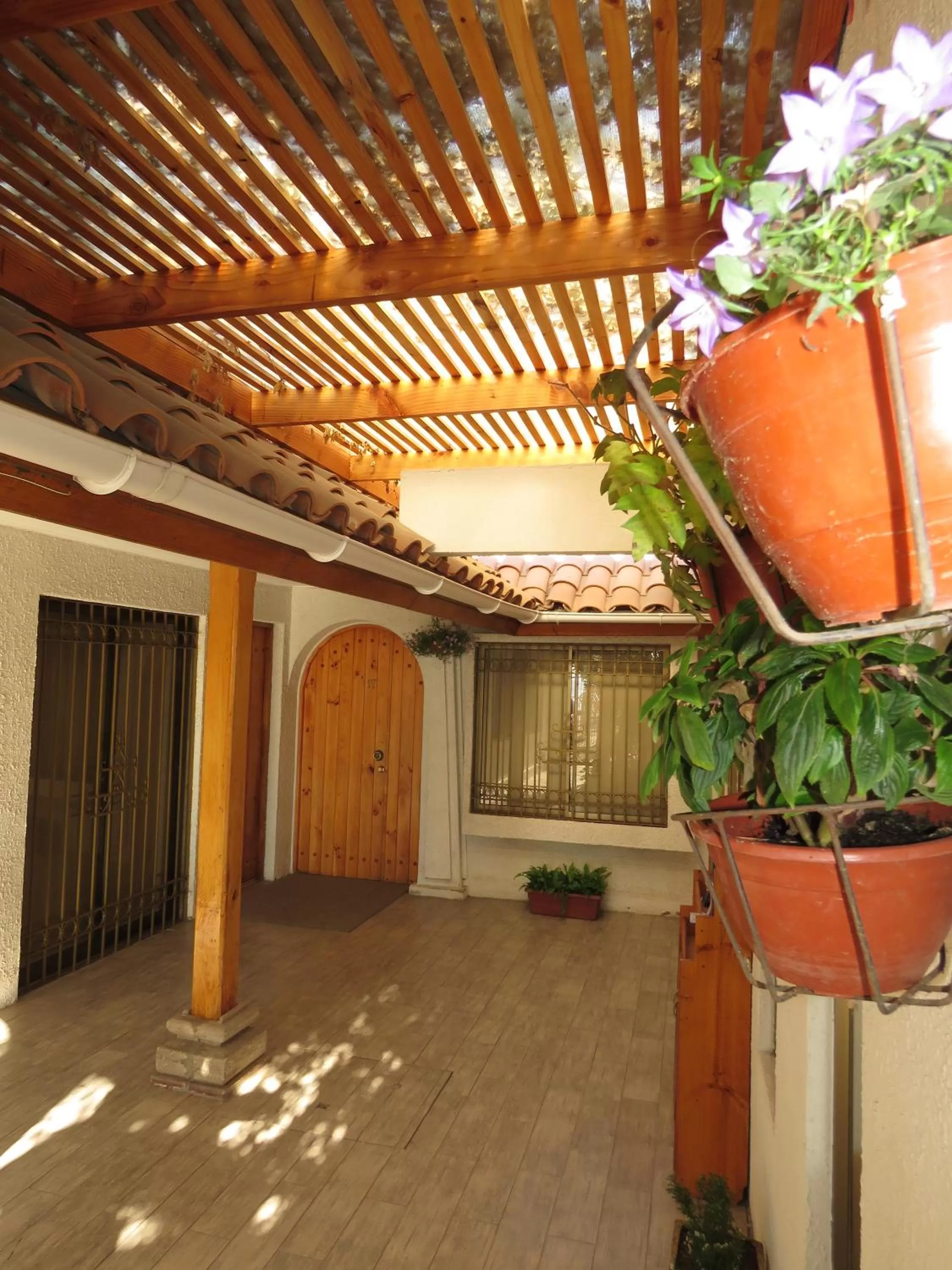Facade/entrance, TV/Entertainment Center in Hotel La Fuente