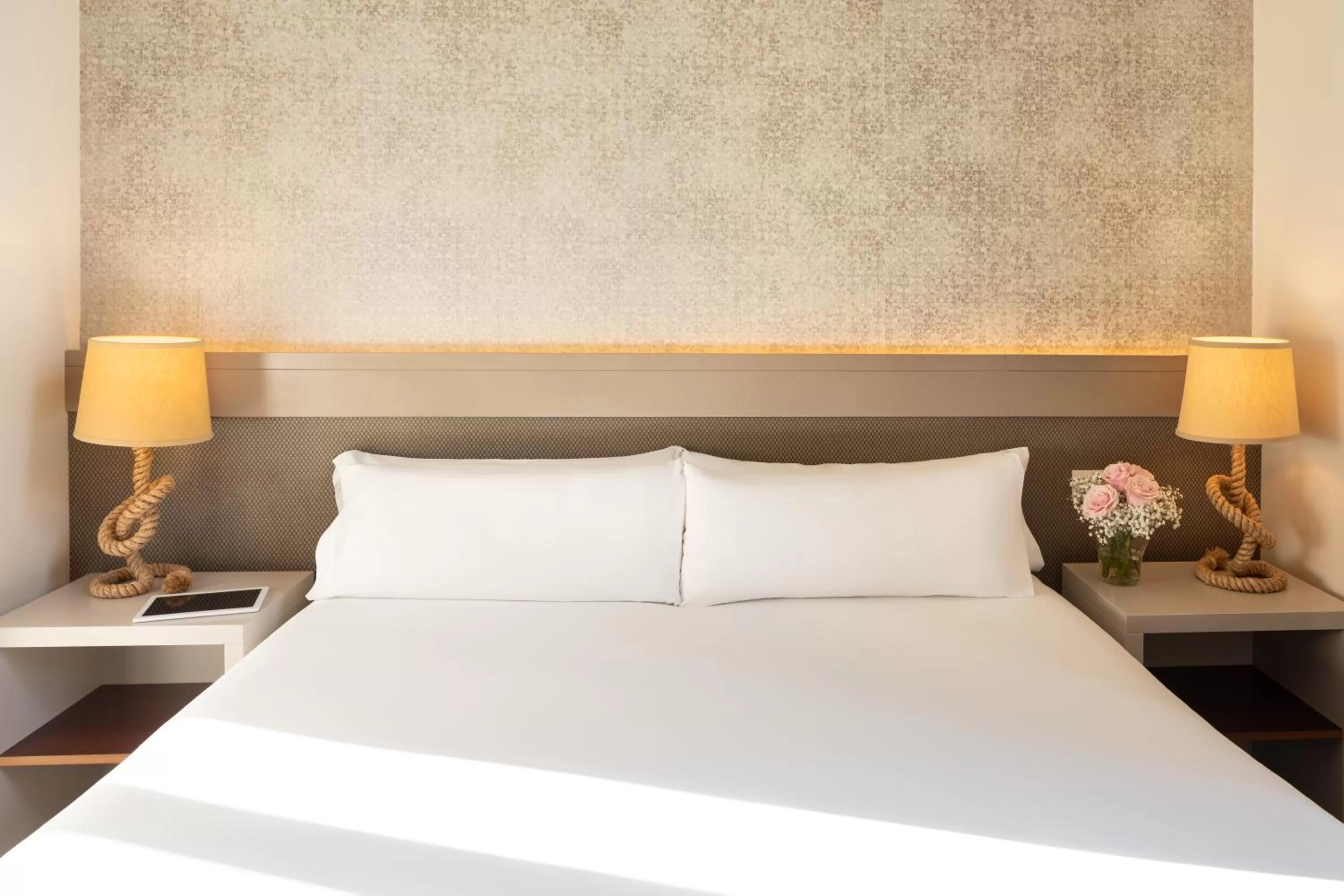 Bed in Duquesa Suites Landmark Hotel by Grup Duquessa