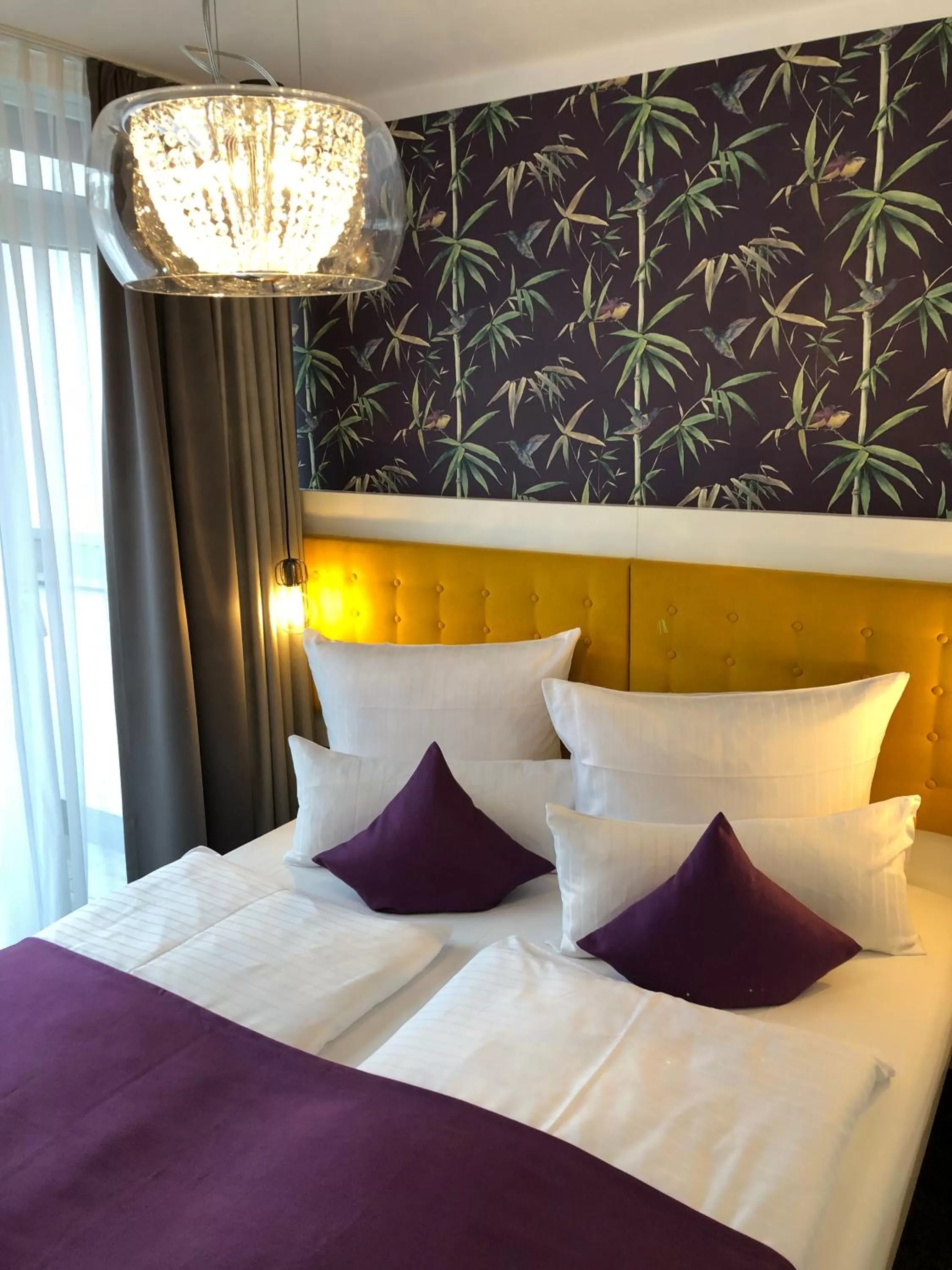 Bed in Hotel Mirabell by Maier Privathotels