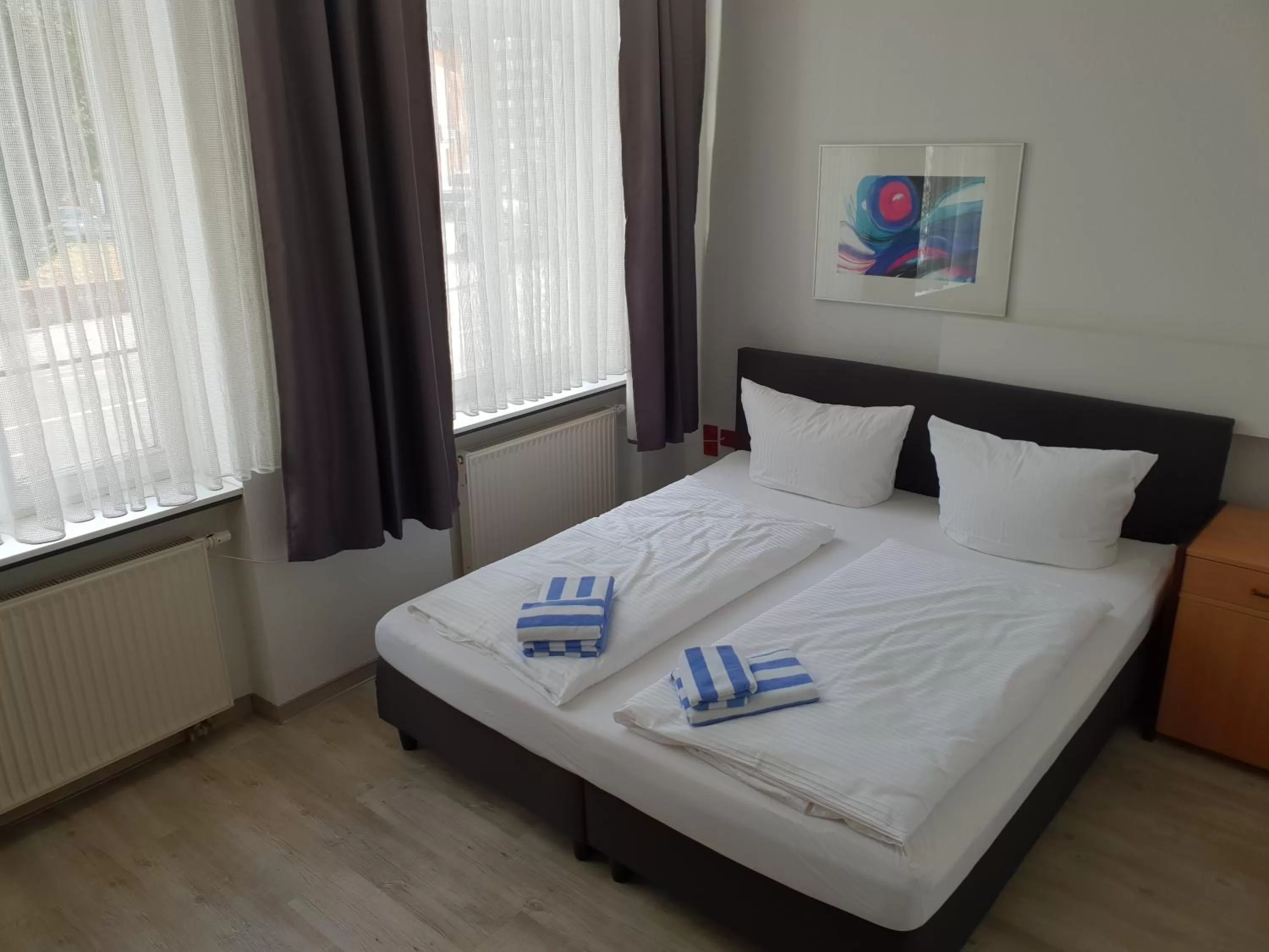 Bed in Appartement-Hotel Rostock
