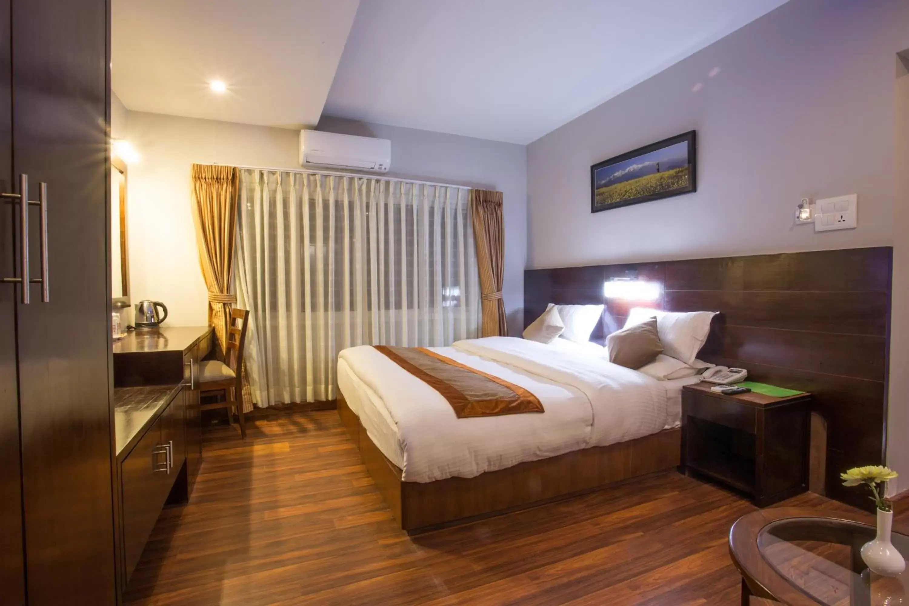 Bed in Aryatara Kathmandu Hotel