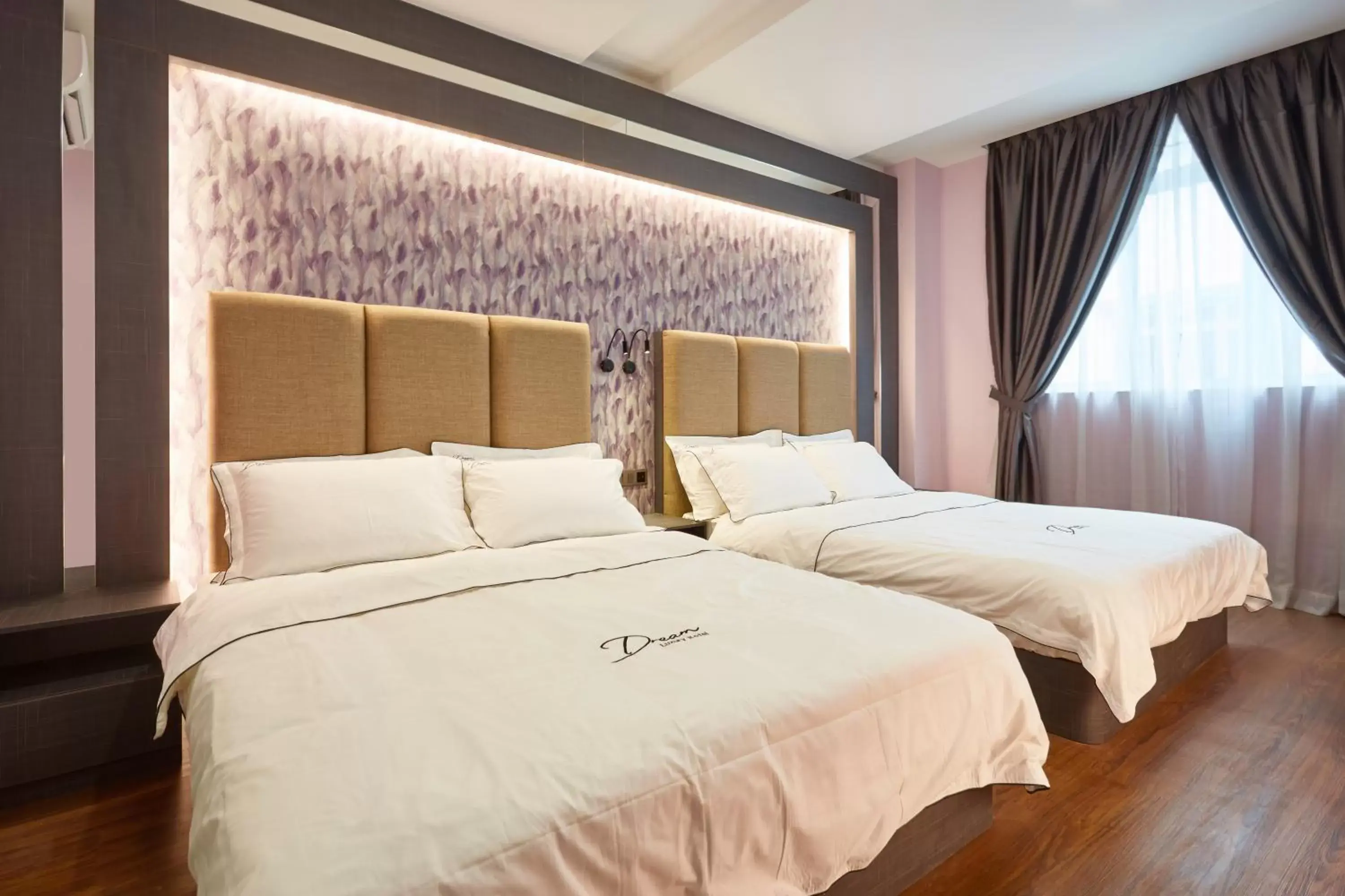 Bed in DREAM LUXURY HOTEL
