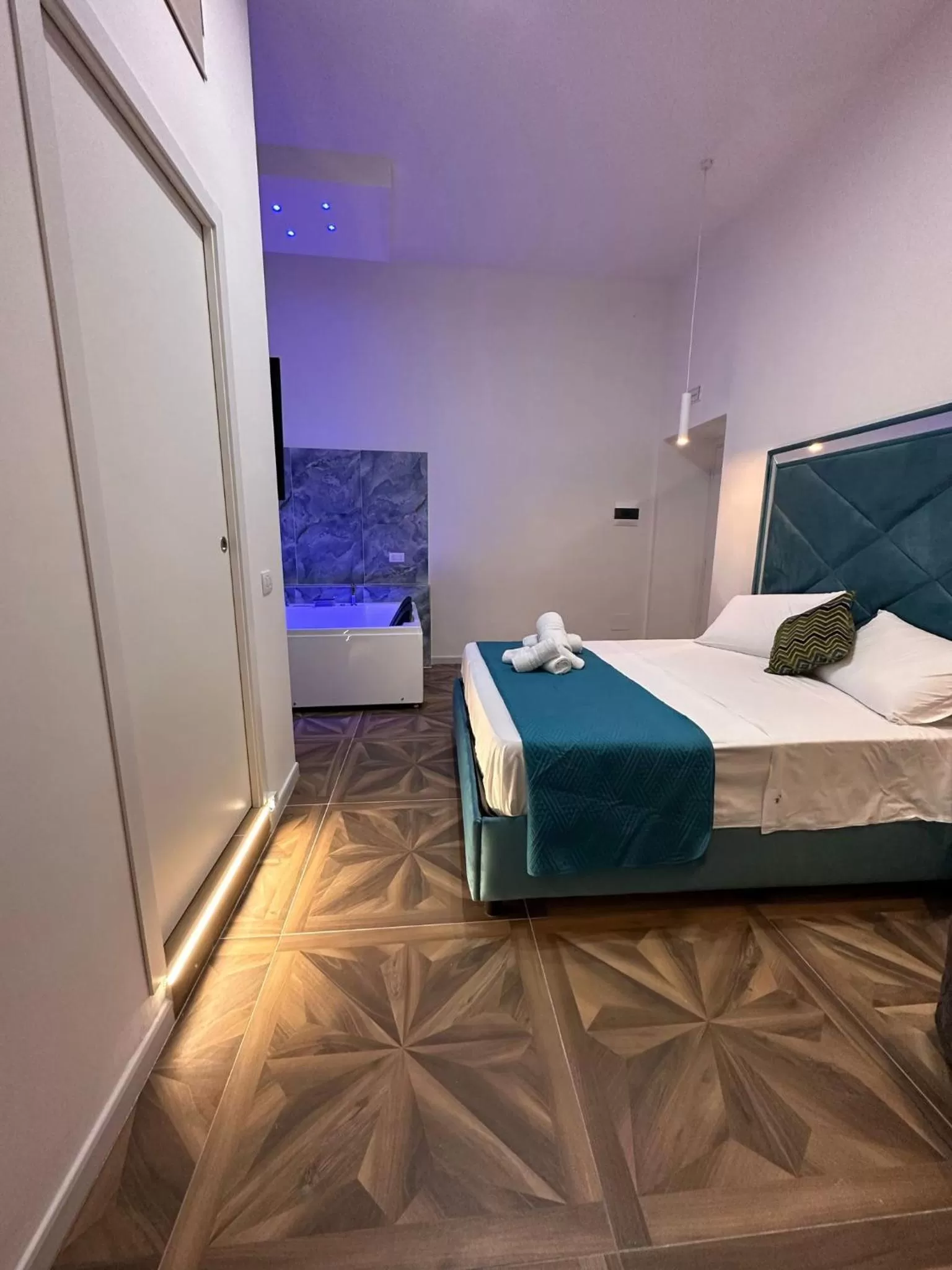 Bed in San Ferdinando suite room