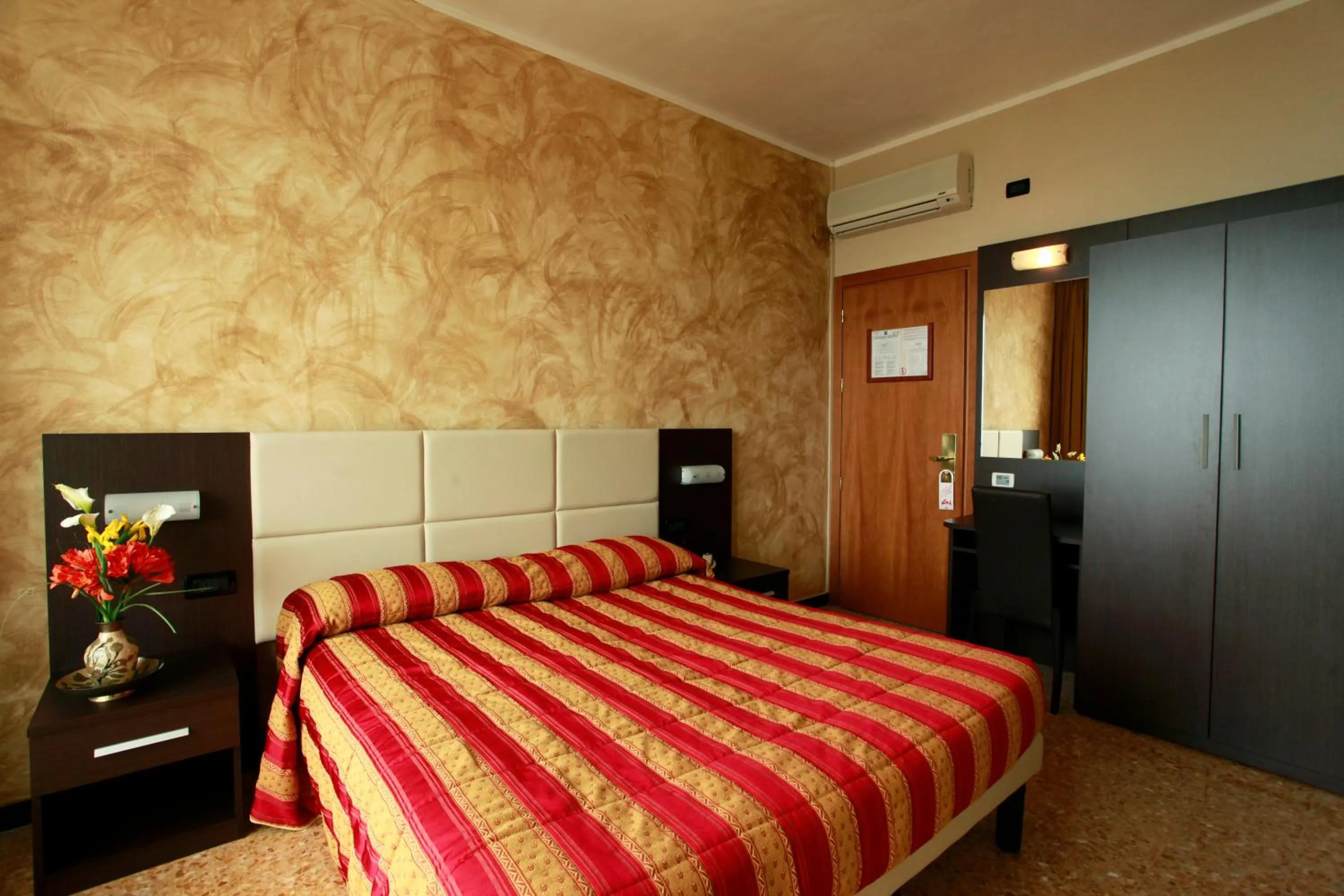 Bedroom in Piccolo Hotel