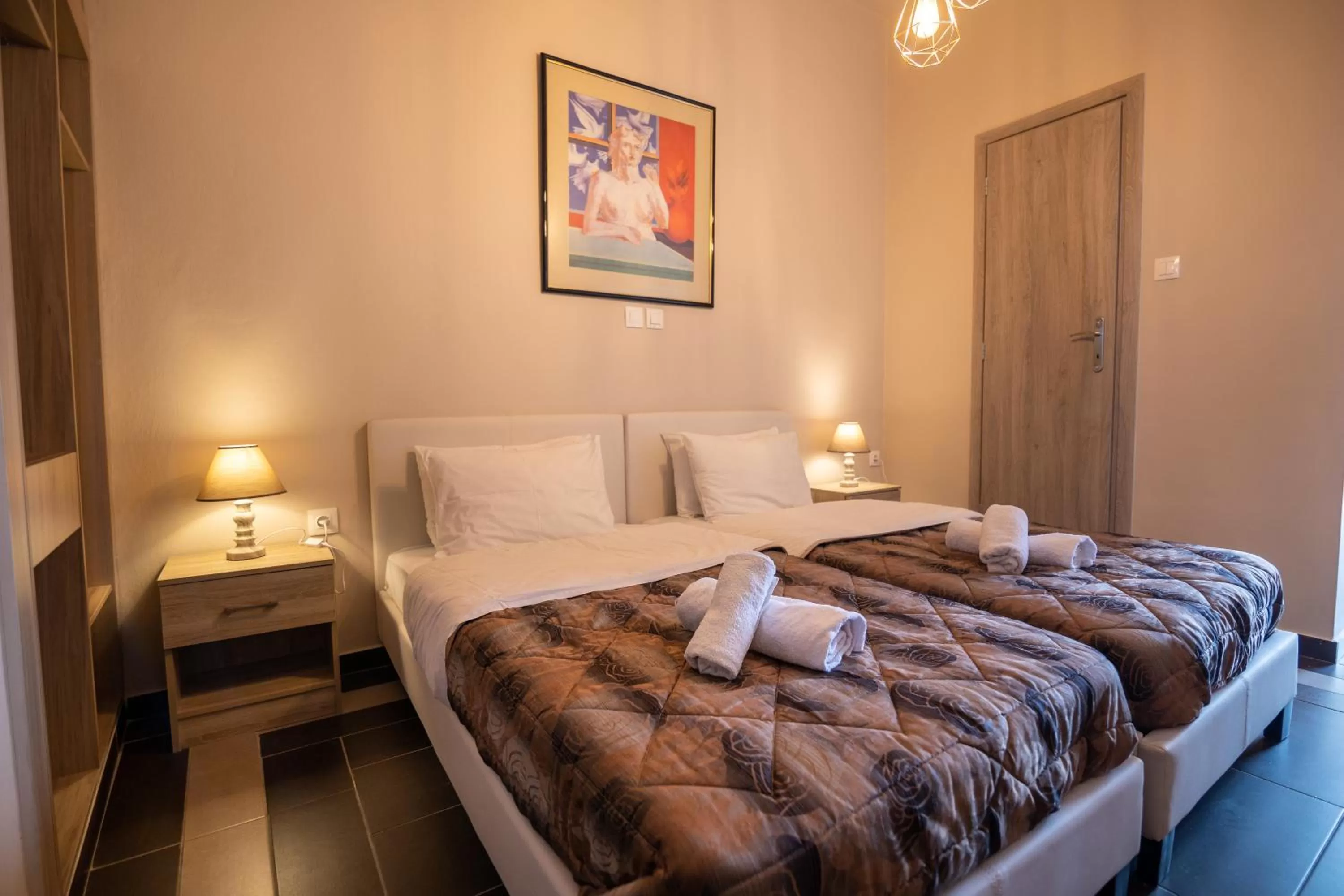 Bed in Votsalakia Hotel & Luxury Apartments