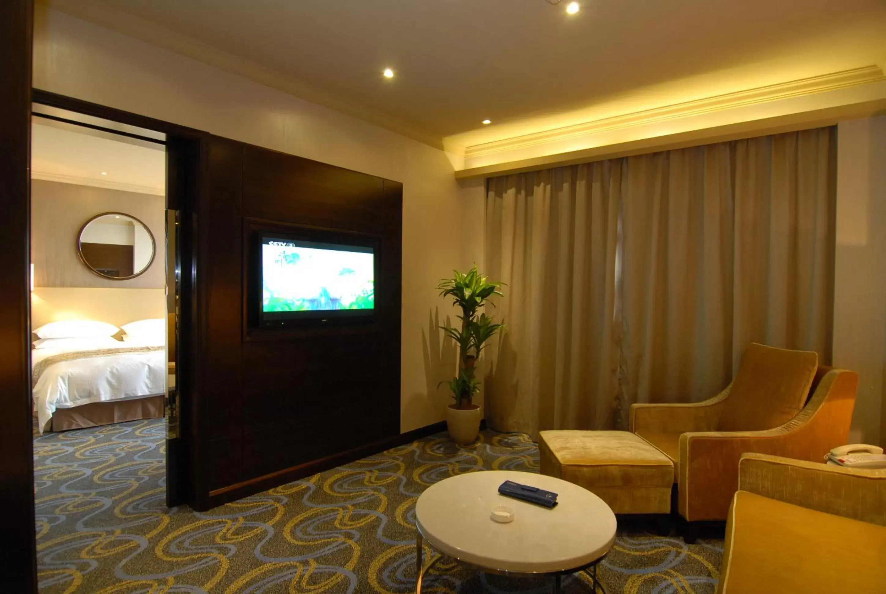 Photo of the whole room, TV/Entertainment Center in Ocean Hotel