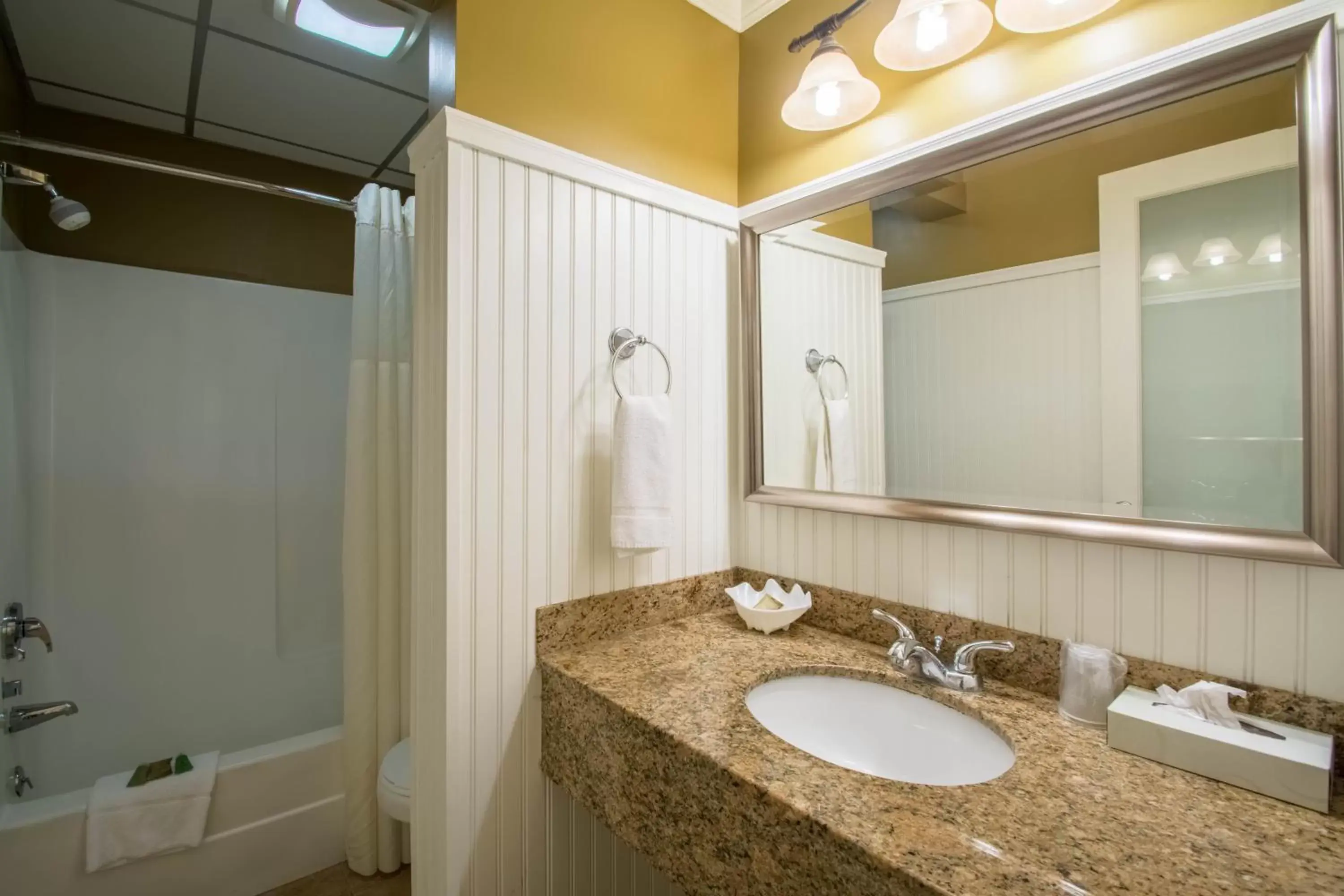 Bathroom in Anchorage Inn and Suites