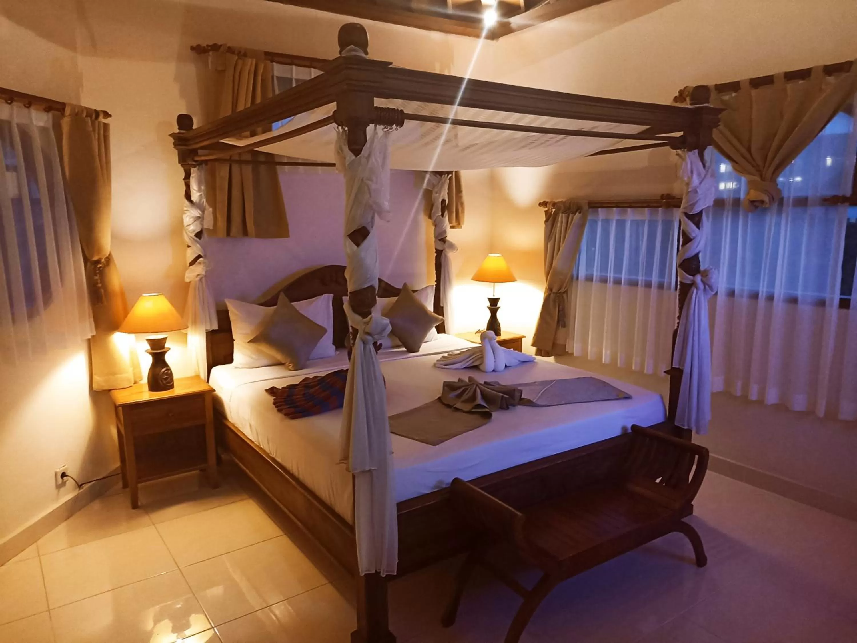 Bed in Kusnadi Hotel